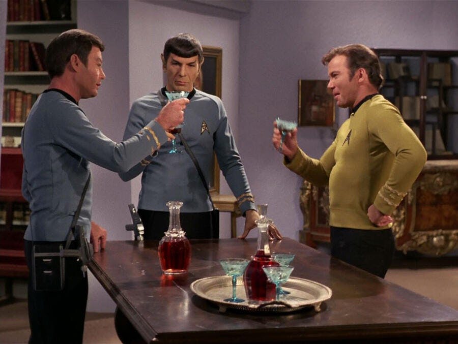 McCoy, Spock, and Kirk raise a glass in 'Requiem for Methuselah'
