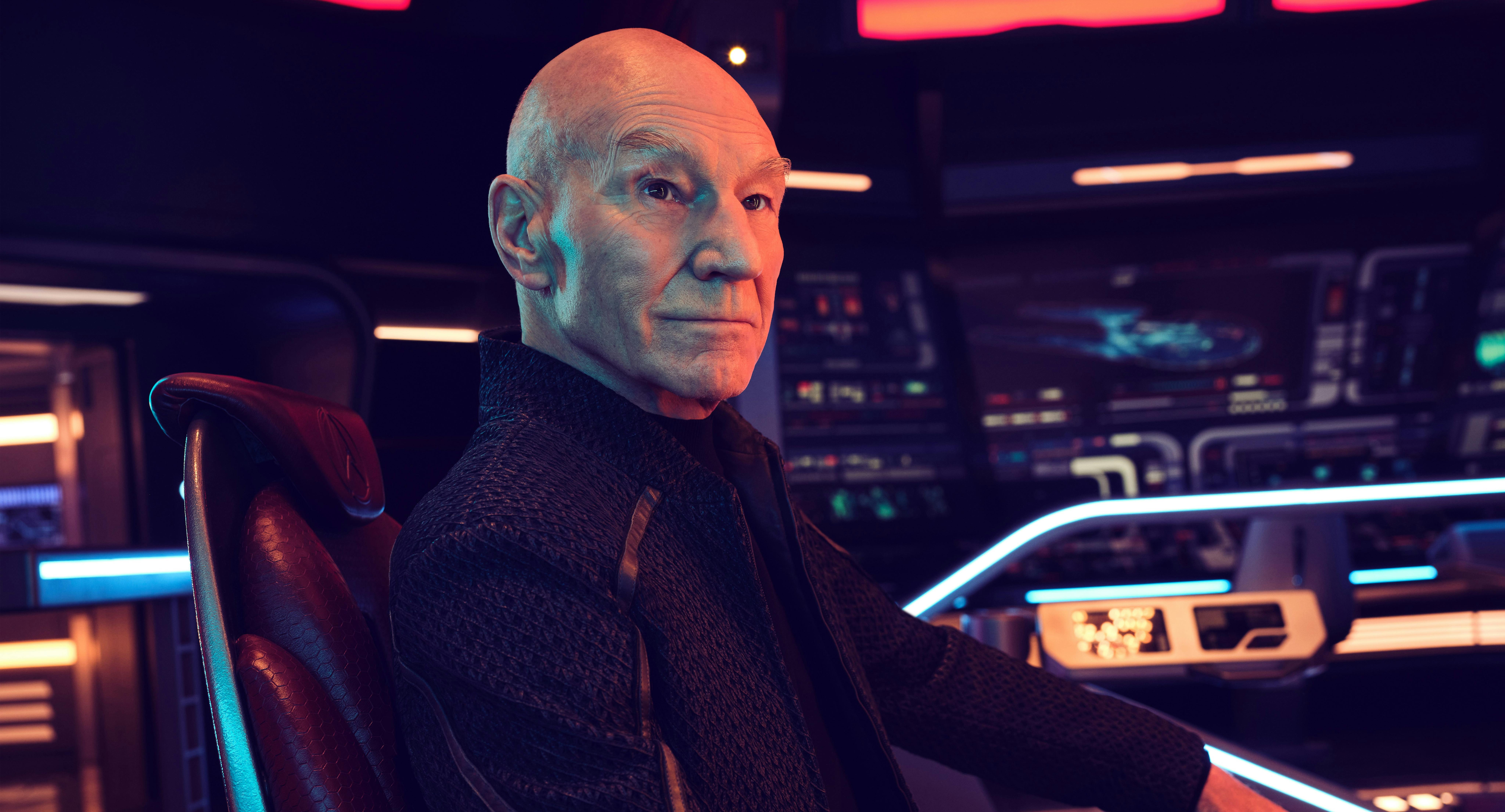Admiral Jean-Luc Picard sits on the Bridge of the U.S.S. Titan