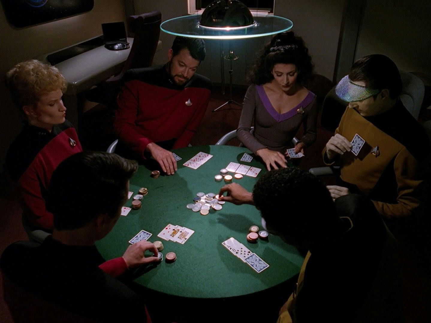 Shelby joins the Riker, Deanna Troi, Data, Geordi La Forge, and Wesley Crusher for a game of poker in crew quarters on the Enterprise in 'The Best of Both Worlds, Part I'