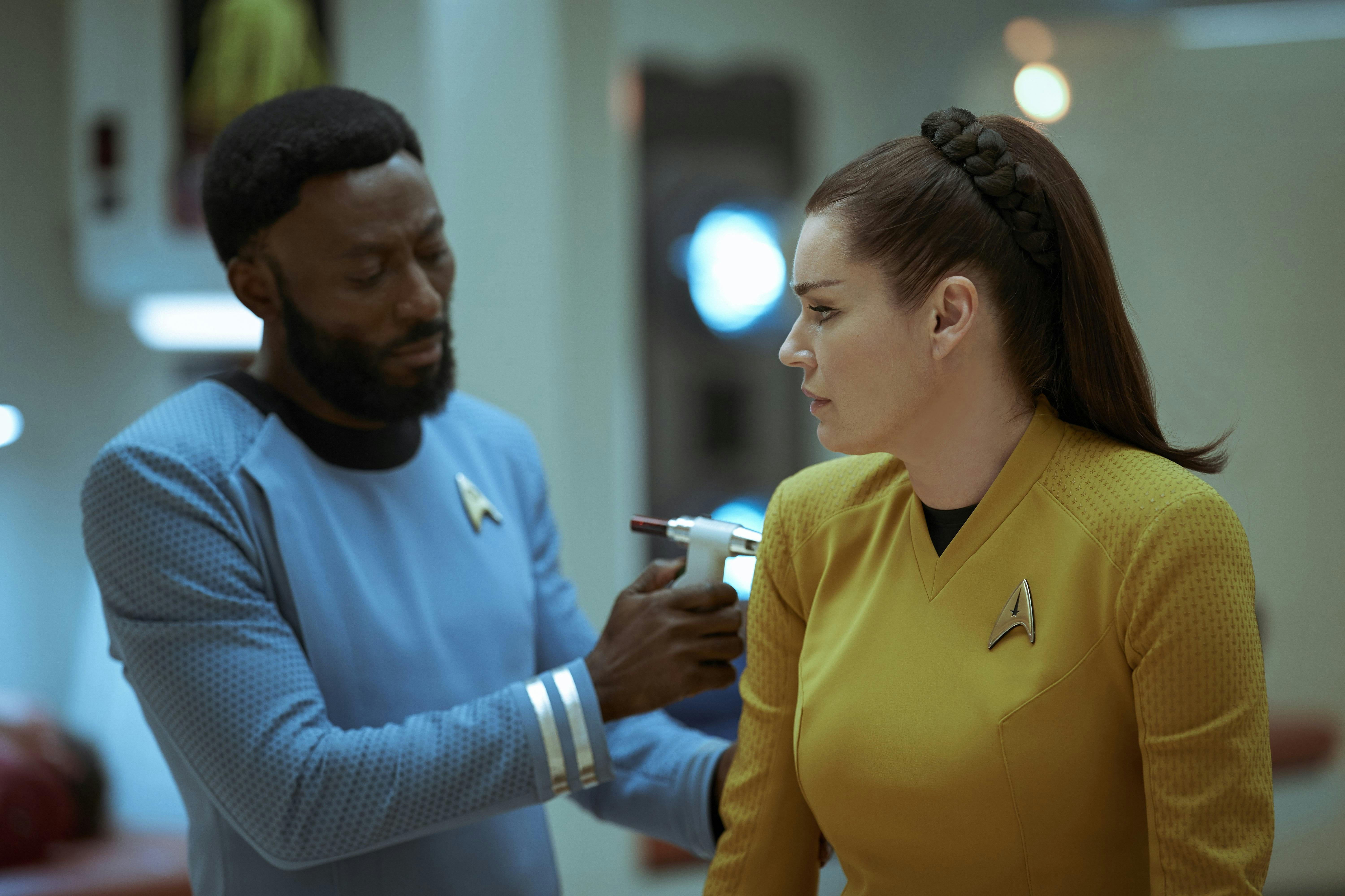 In Sickbay, Dr. M'Benga observes Una Chin Riley's vitals in 'Ghosts of Illyria'