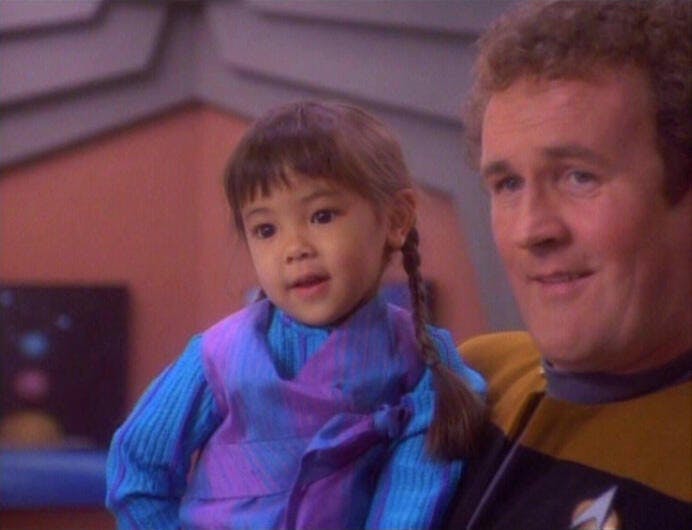 Miles O'Brien carries his daughter Molly in 'A Man Alone'