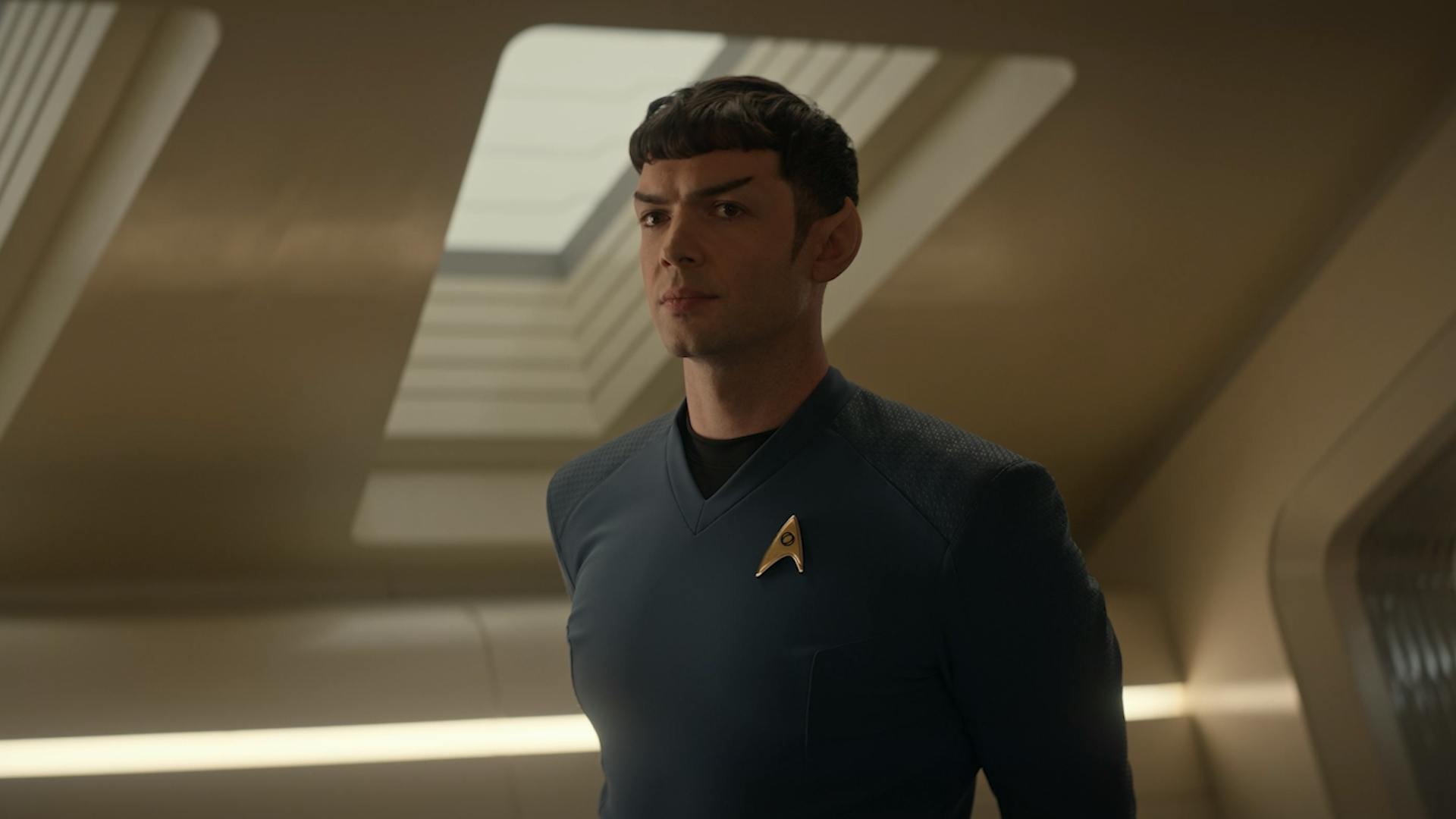 Spock stands with his arms behind him in the captain's ready room in 'The Broken Circle'