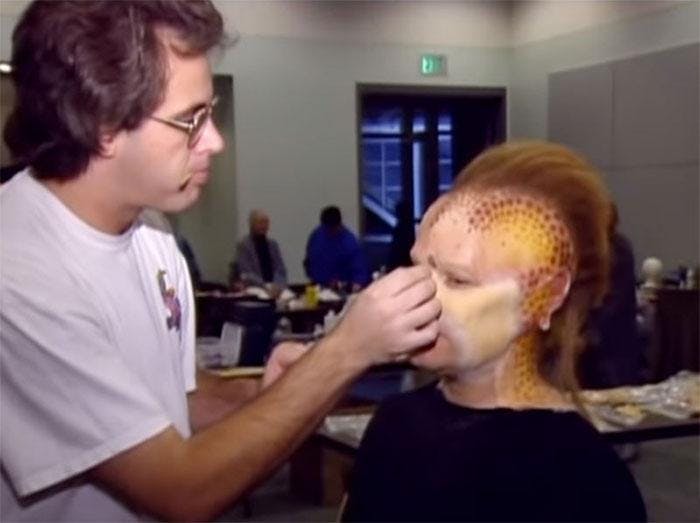Ethan Phillips has Neelix makeup applied on his face for Star Trek: Voyager