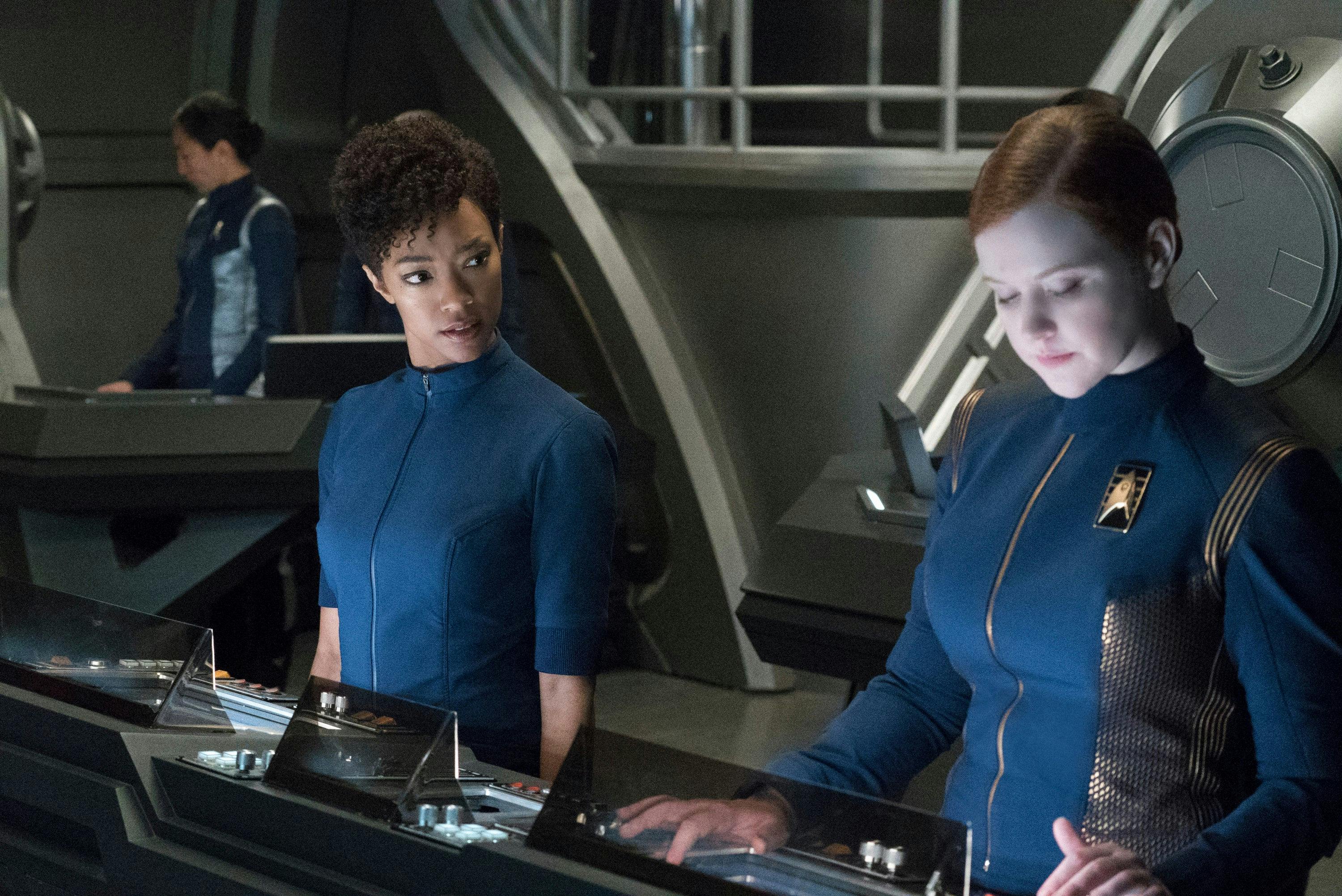 Michael Burnham looks over her shoulder towards Cadet Sylvia Tilly in 'Context is For Kings'