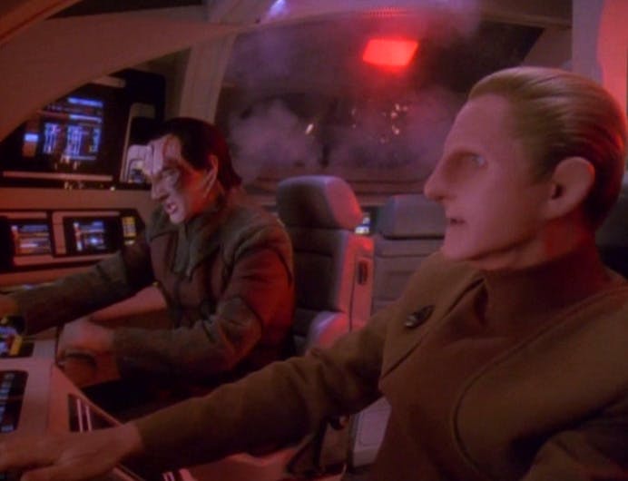 Garak and Odo pilot the runabout as they are pursued by the Jem'Hadar in 'The Die is Cast'