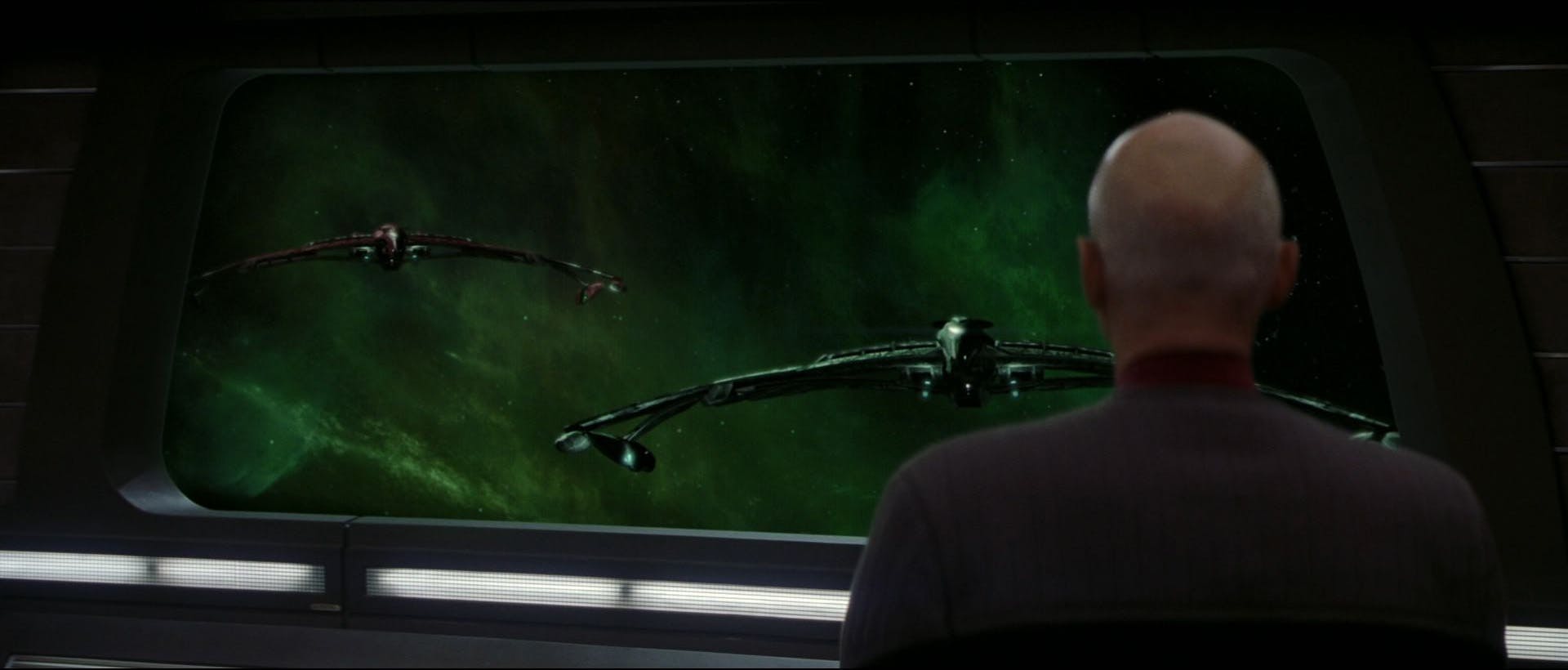 Picard looks out the viewscreen to see the Romulans arrive to support them in Star Trek Nemesis