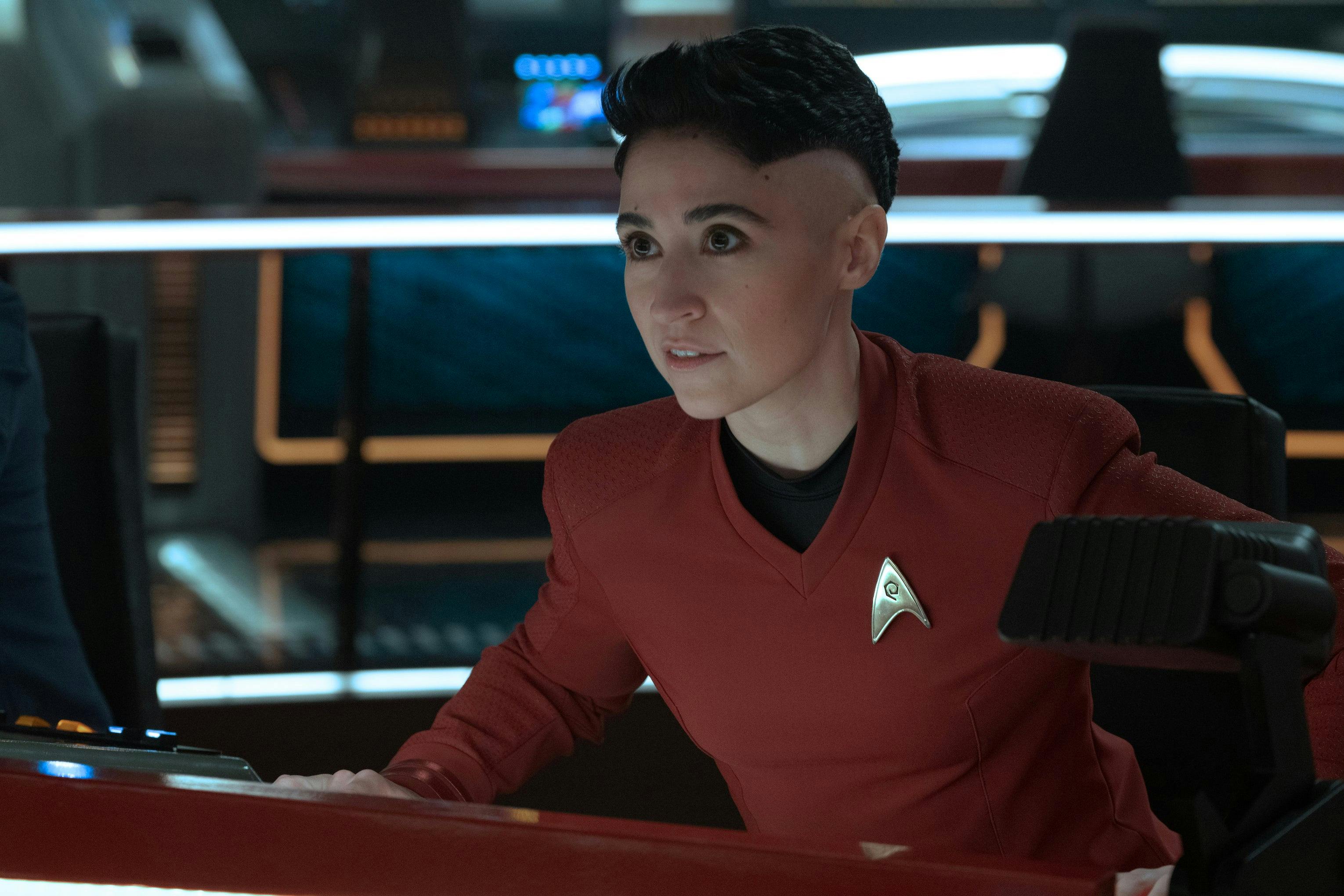At the helm, Erica Ortegas leans forward at her station in 'Among the Lotus Eaters'