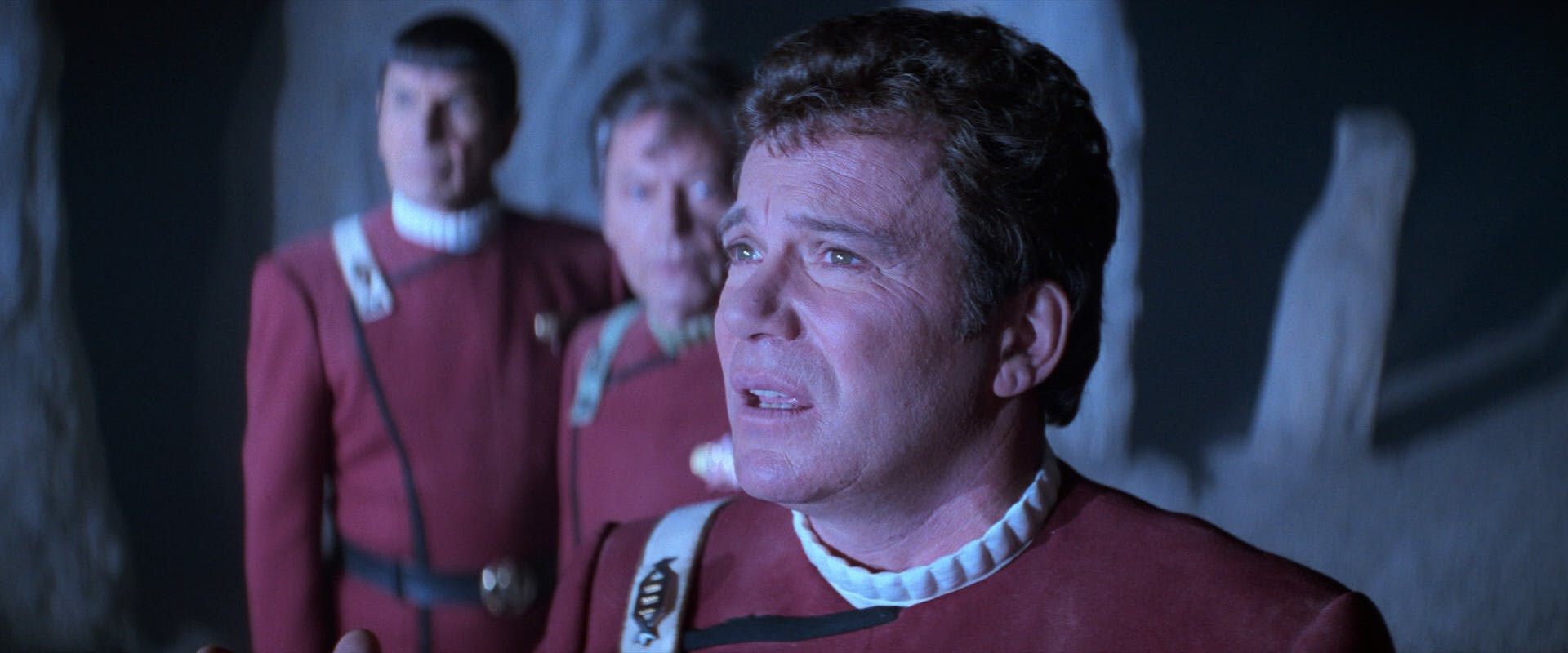 Kirk looks out towards the god of Sha Ke Ree wondering what it needs with a starship as Spock looks out as well, while McCoy looks over at his captain in Star Trek V: The Final Frontier