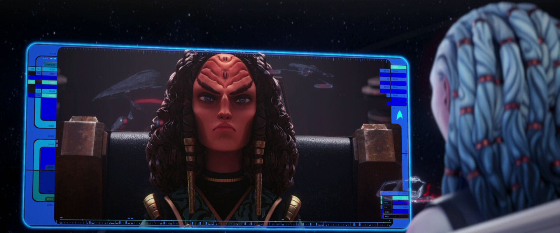 As Gwyn sits in the center seat, with universal translators down, she converses with a Klingon commanding officer in 'Supernova, Part 1'