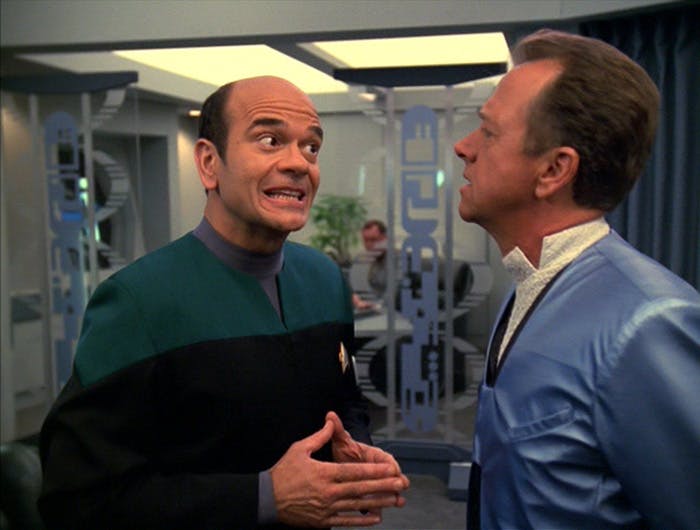 The Doctor converses with the Dinaali Dr. Dysek in Sickbay in 'Critical Care'