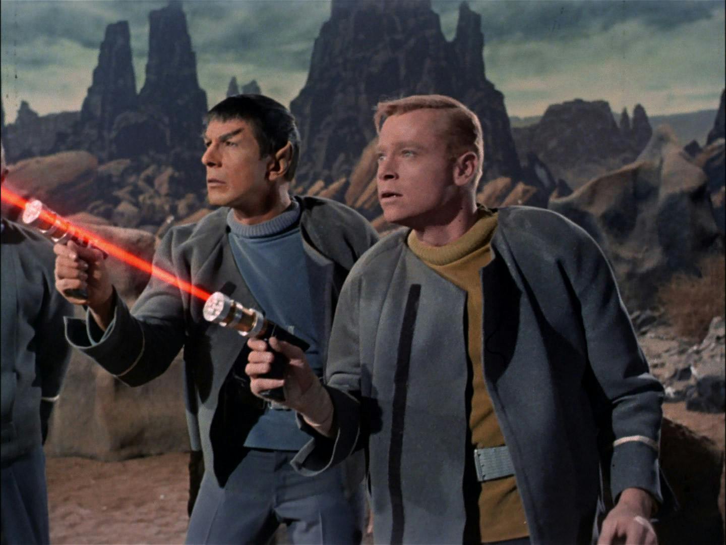 As part of the landing party on Talos IV, Spock and Tyler fires their phasers at a distance ahead of them in 'The Cage'