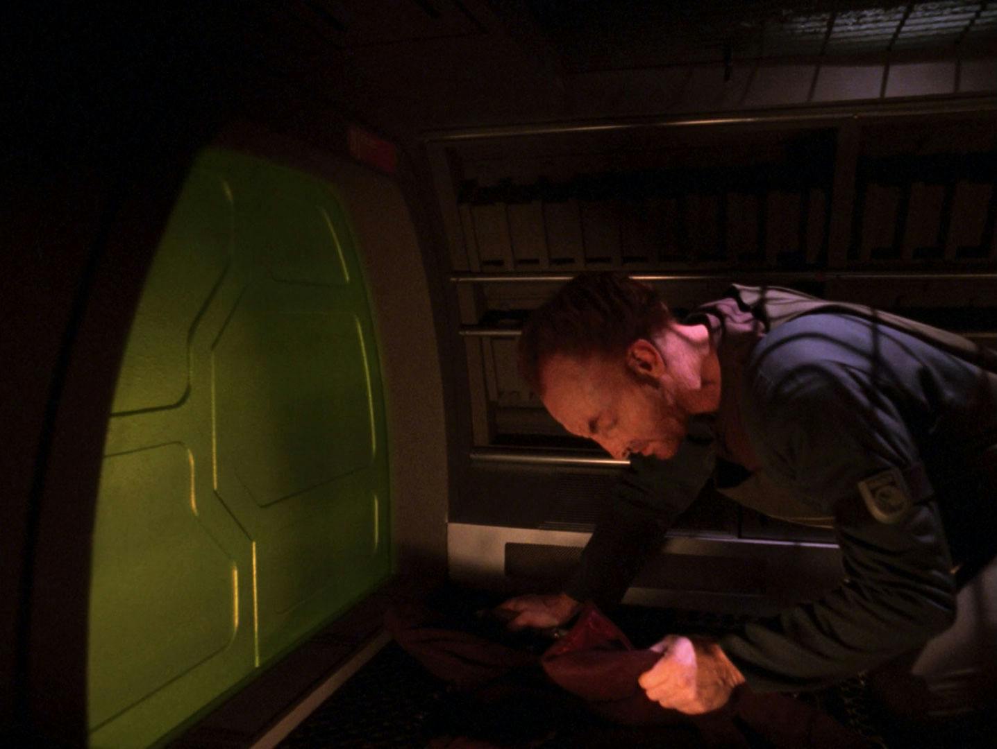 A mercenary pursues Captain Picard as he crawls through a Jefferies tube in 'Starship Mine'