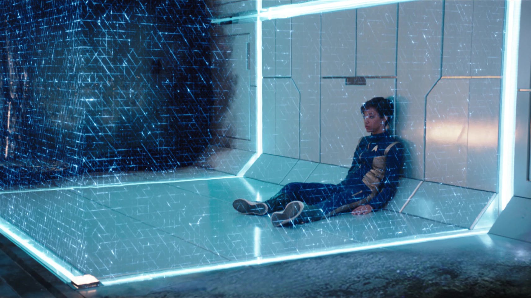 Michael Burnham sits deflated in the Shenzhou's brig in 'Battle at the Binary Stars'