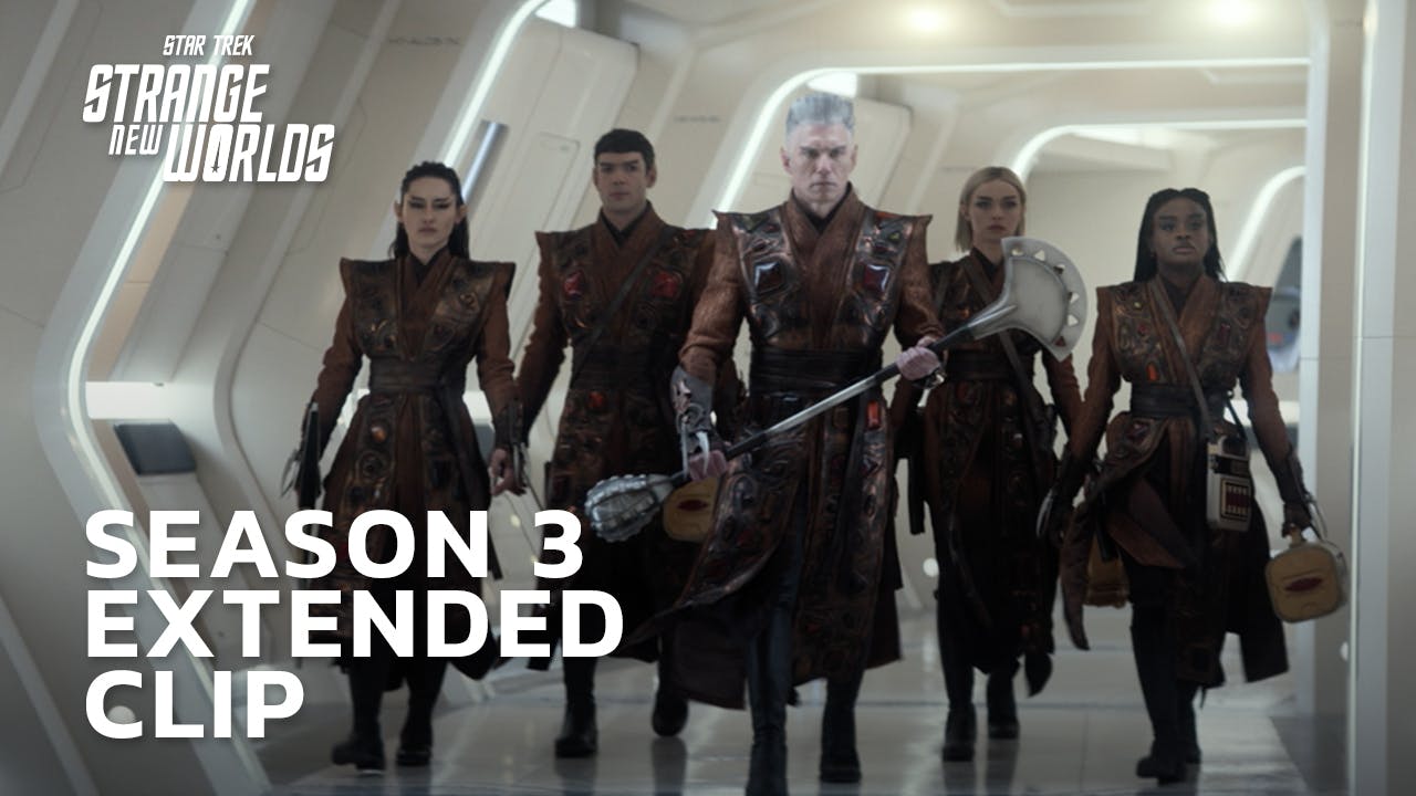 La'An, Spock, Pike, Chapel, and Uhura walk down the Enterprise corridor in Vulcan attire and gear
