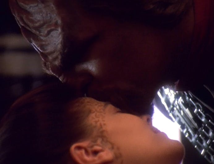 Close up of Worf kissing Jadzia Dax's forehead as she is recovering in Sickbay in 'Change of Heart'