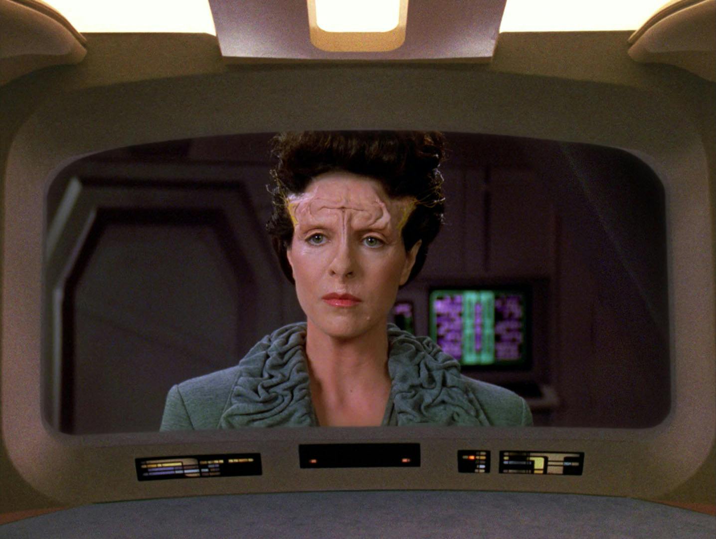 Close-up of Dr. Serova on the Enterprise-D's viewscreen in 'Force of Nature'