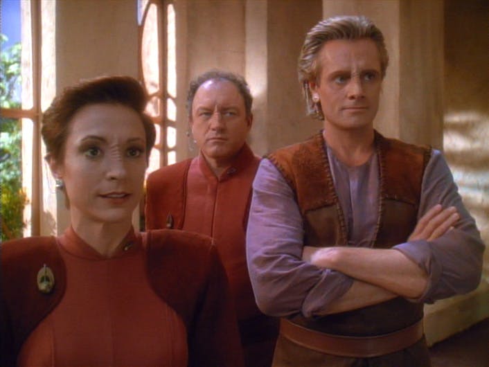 Kira Nerys stands beside Shakaar Edon and another member of the Bajoran Militia in 'Shakaar'