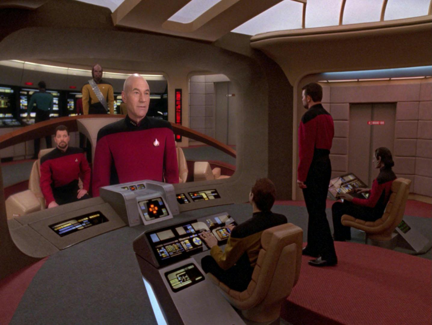 An Enterprise-D led captained by William T. Riker looks at his viewscreen to see an Enterprise-D captained by Jean-Luc Picard with Riker as his first officer in 'Parallels'