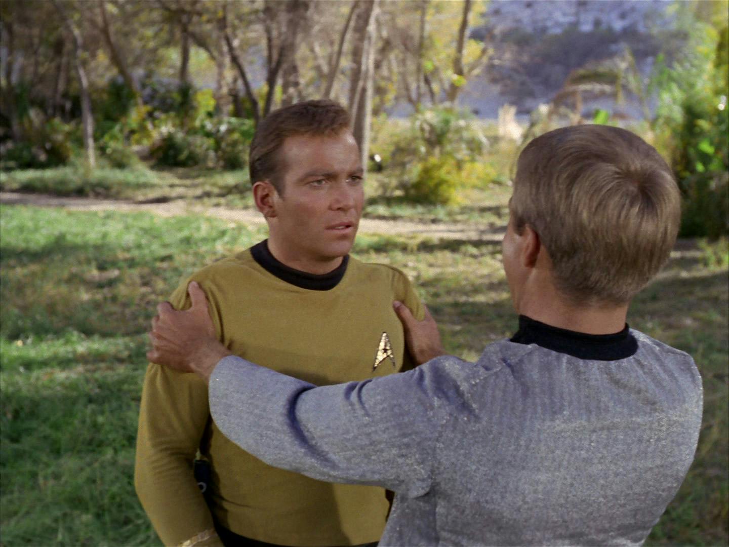 On the surface of a planet, Kirk is shocked when his tormentor from his Academy days, Finnegan, appears before him gripping his shoulders in 'Shore Leave'