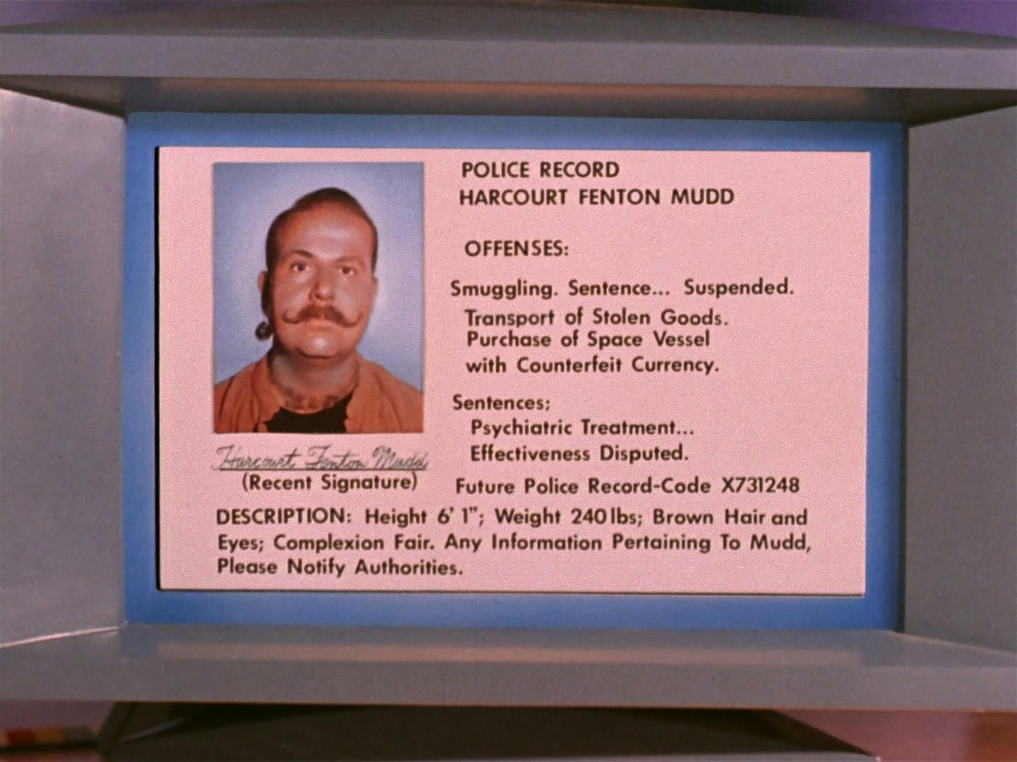 The Enterprise bridge looks at an enlarged police record of Harry Mudd on the viewscreen in 'Mudd's Women'