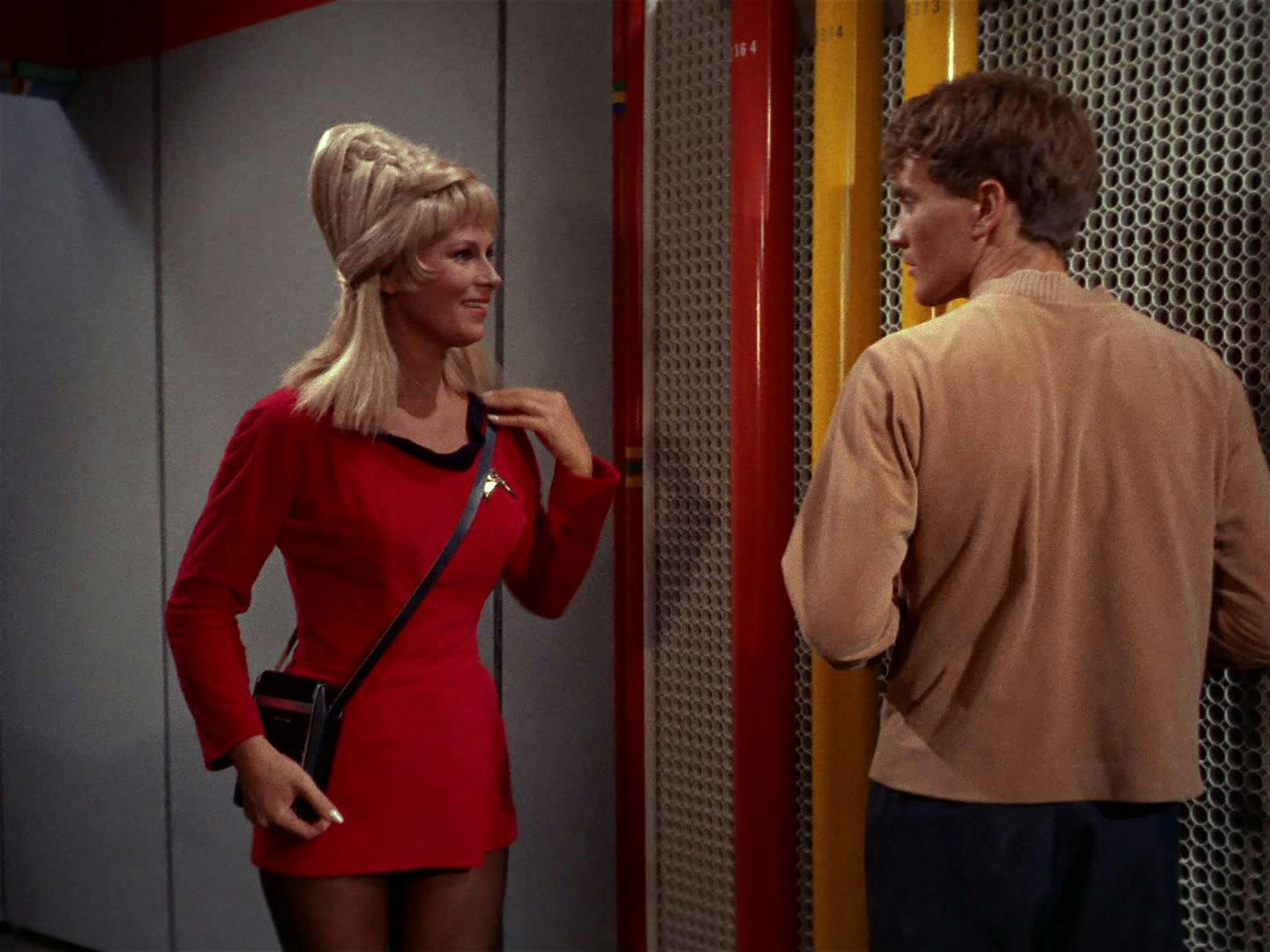 Janice Rand encounters Charlie Evans in a corridor on the Enterprise in 'Charlie X'