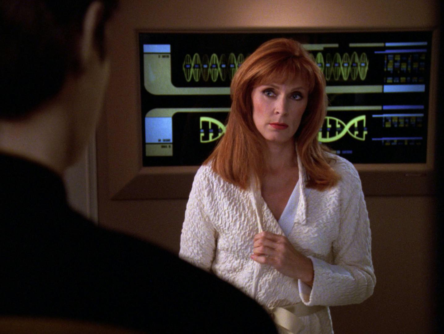 Data visits Dr. Beverly Crusher in her office and poses a philosophical question in 'The Quality of Life'