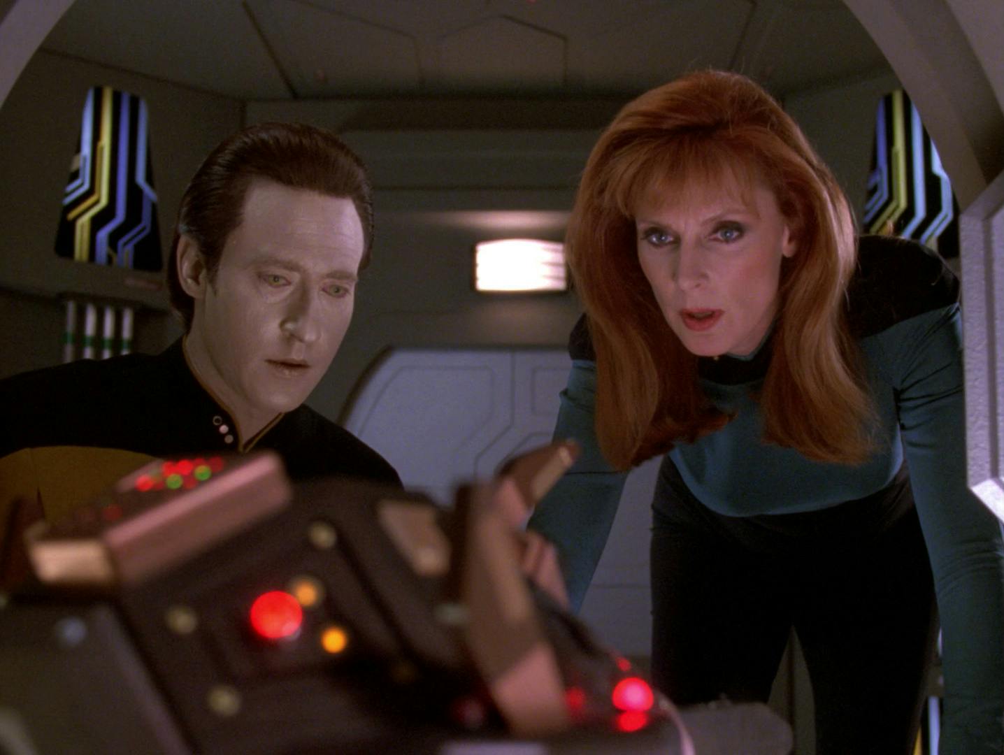 Data and Dr. Beverly Crusher observe an exocomp in the Jefferies tube in 'The Quality of Life'