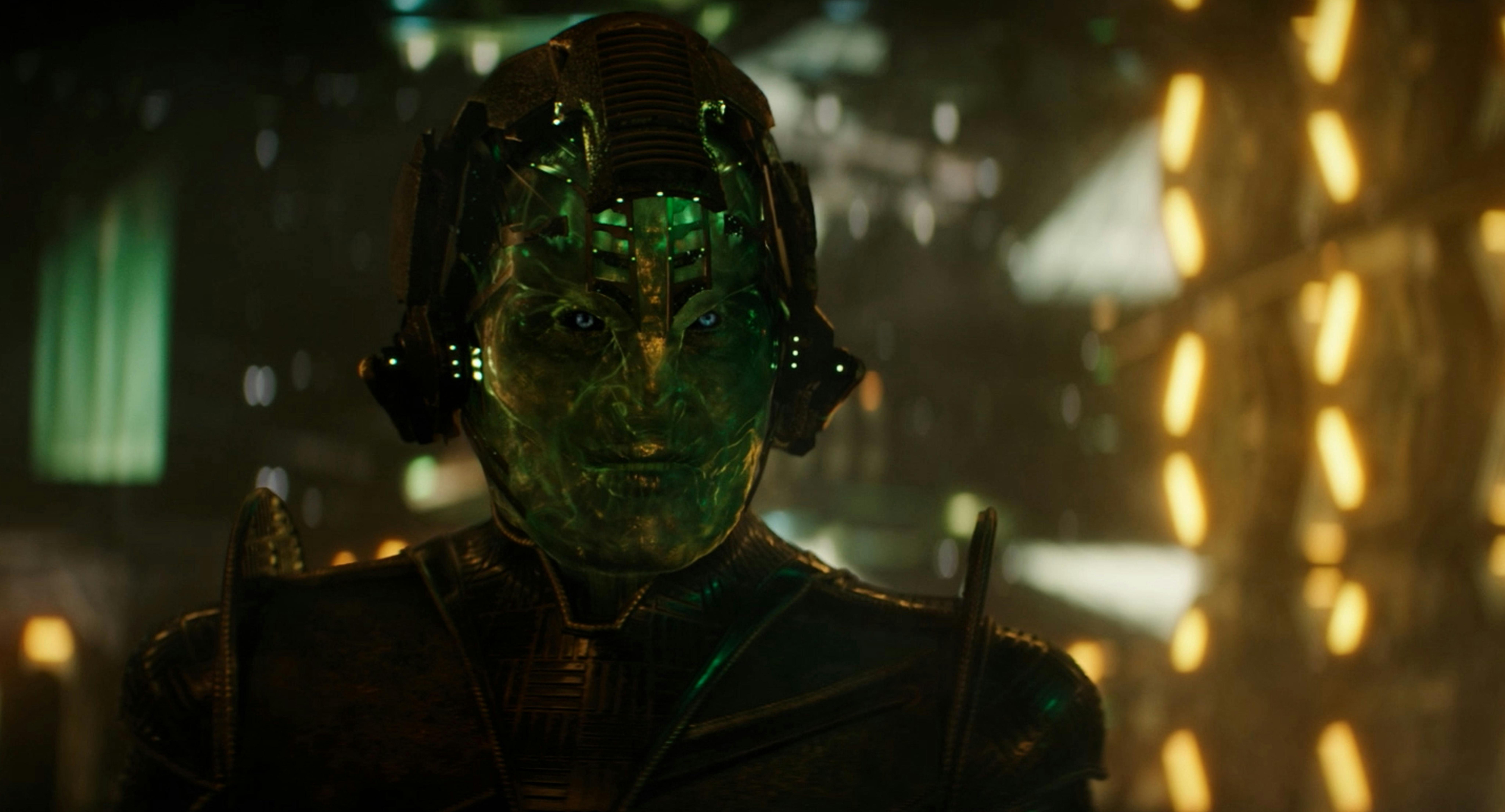 The Breen Primarch removes his helmet to reveal his translucent green face in 'Mirrors'