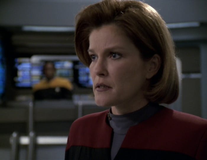 Close-up of a Janeway reacting intently to Voyager's viewscreen in 'Unimatrix Zero, Part I'