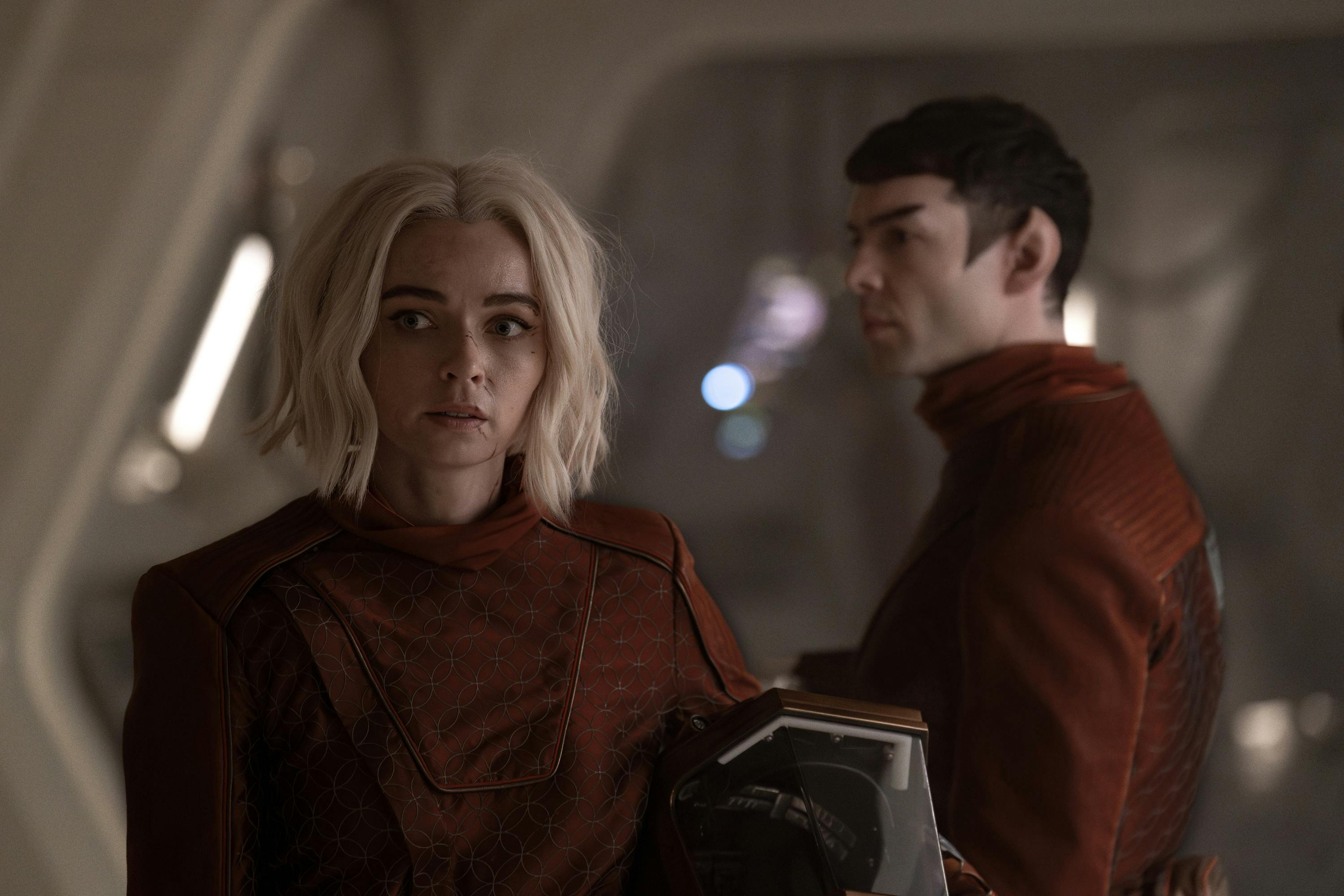 Chapel and Spock in their surgical suits in the corridor in 'Hegemony, Part II'