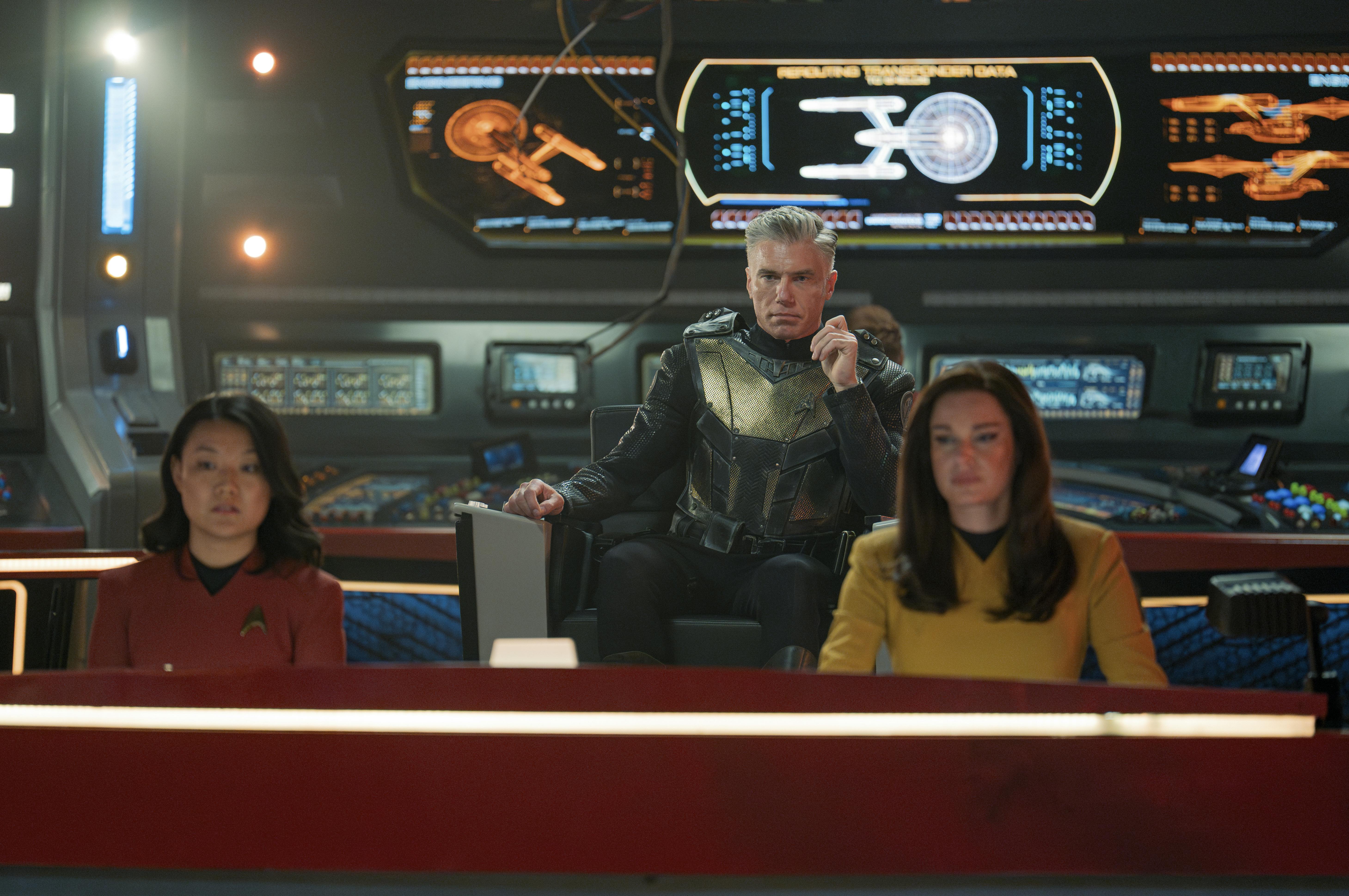 Jenna Mitchell, Captain Pike, and Una Chin-Riley at their stations aboard the Enterprise in 'Hegemony, Part II'