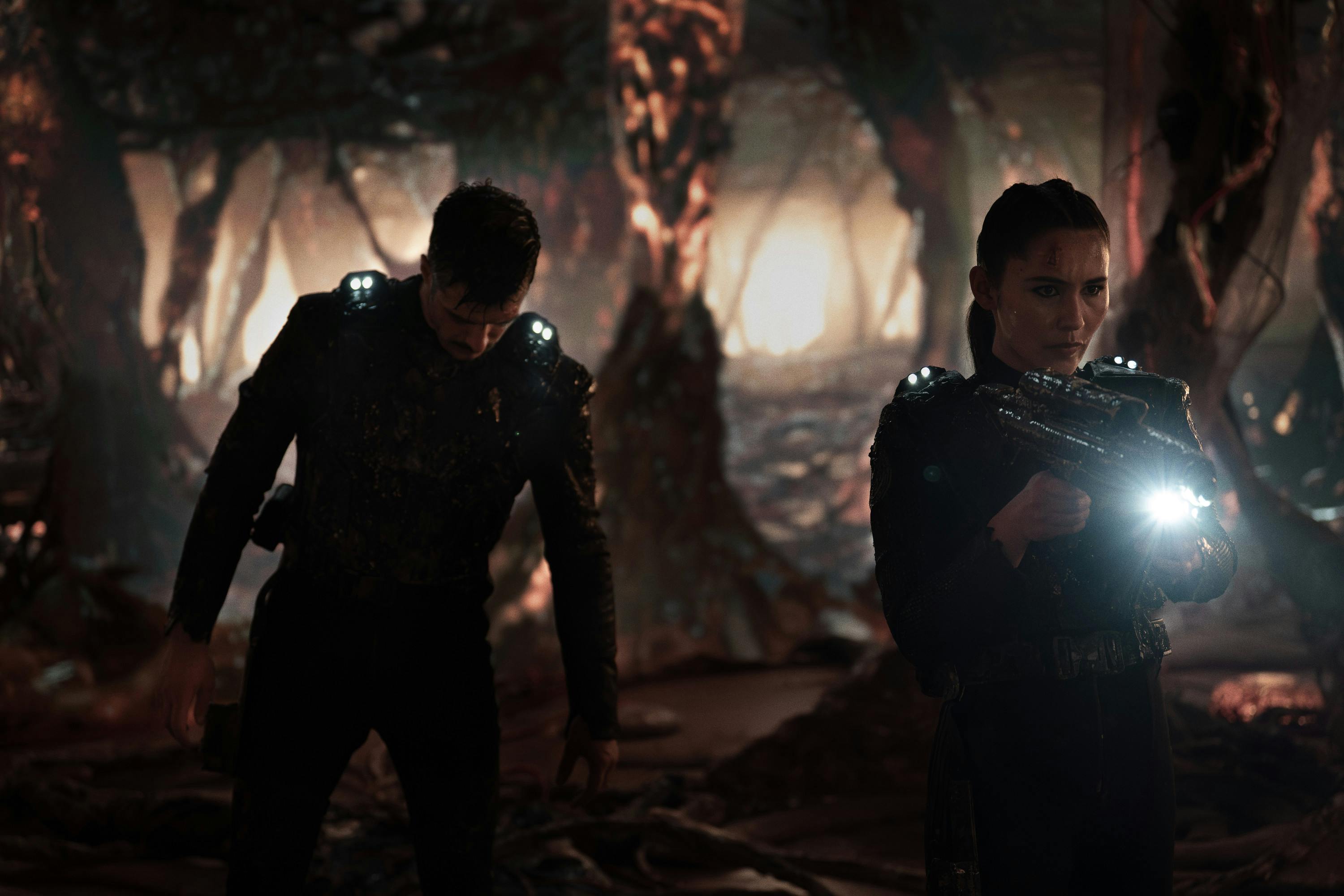 La'An stands defensively after recovering their recovered weapons as Sam Kirk stands behind her on the Gorn Destroyer in 'Hegemony, Part II'