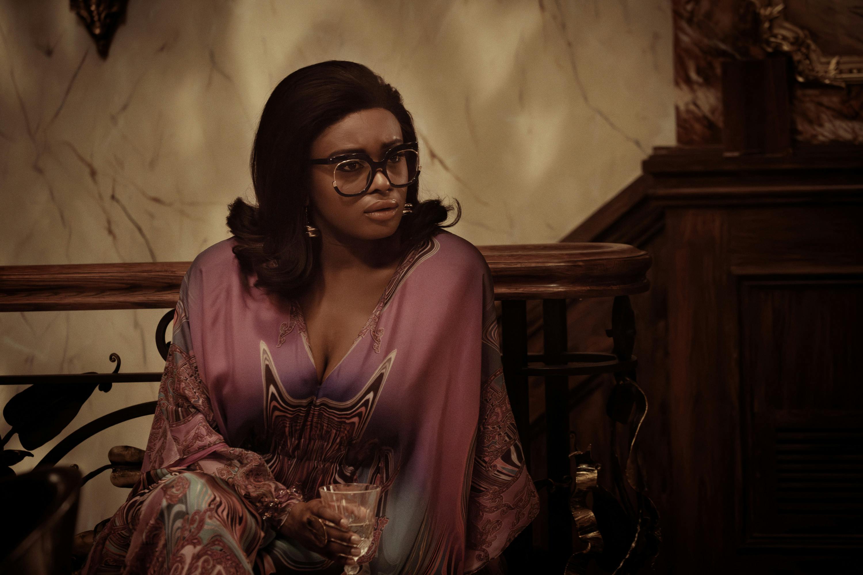 Uhura as Joni Gloss sits while a Holodeck program runs in 'A Space Adventure Hour'