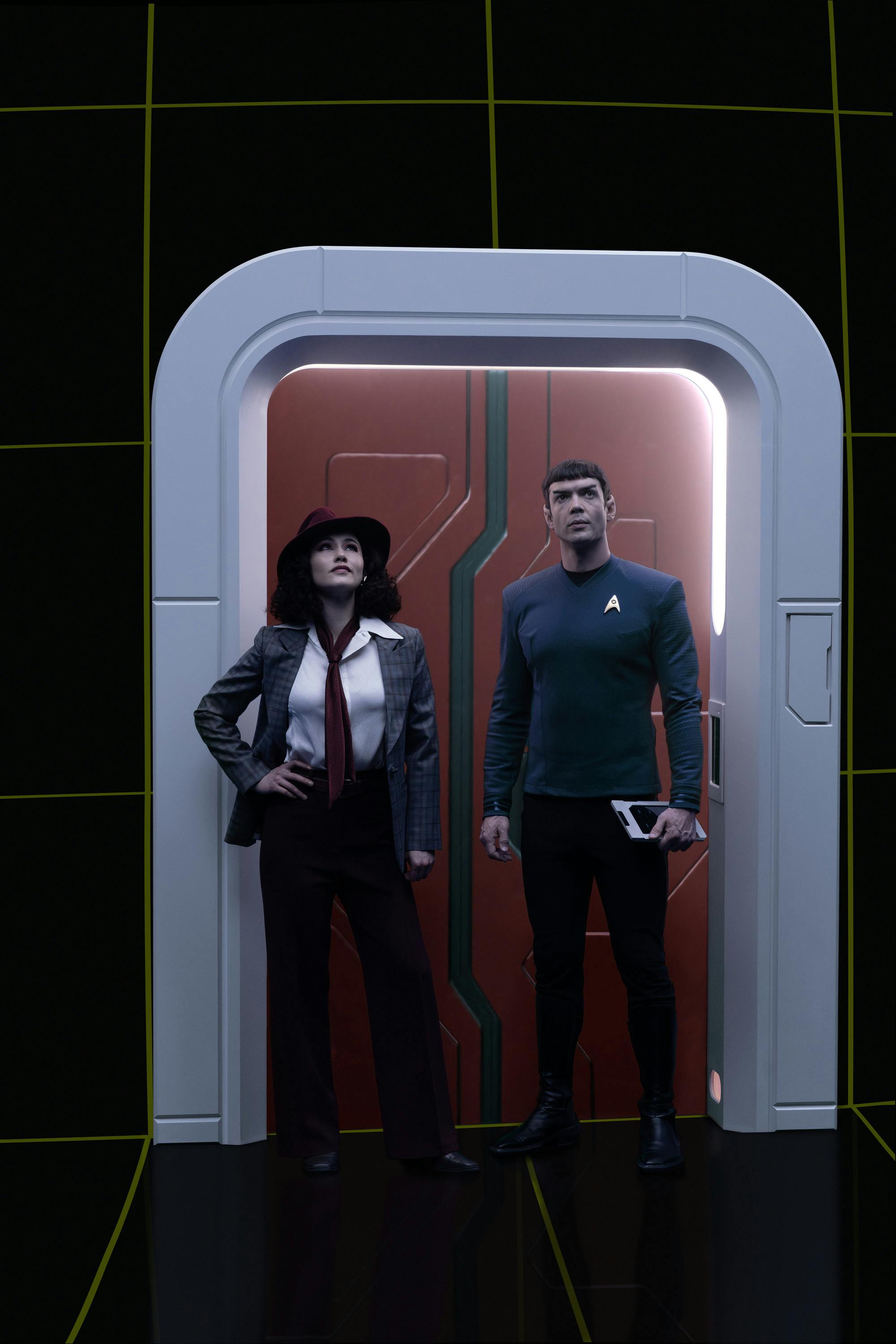 La'An, dressed as Amelia Moon, and Spock step into the Enterprise's Holodeck in 'A Space Adventure Hour'