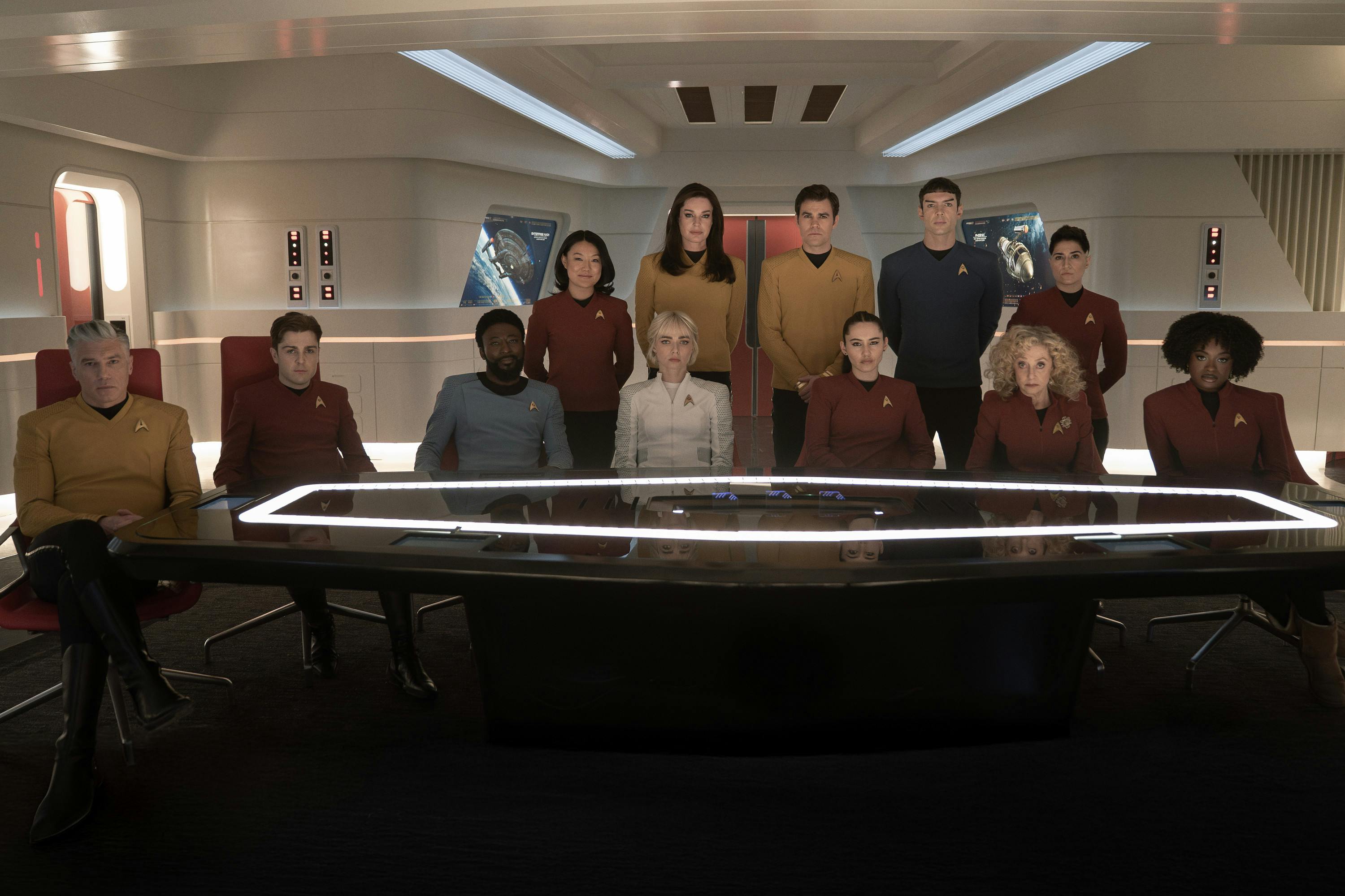 The Enterprise crew and Farragut's acting captain James T. Kirk are seated around the Ready Room conference table in 'The Sehlat Who Ate Its Tail'