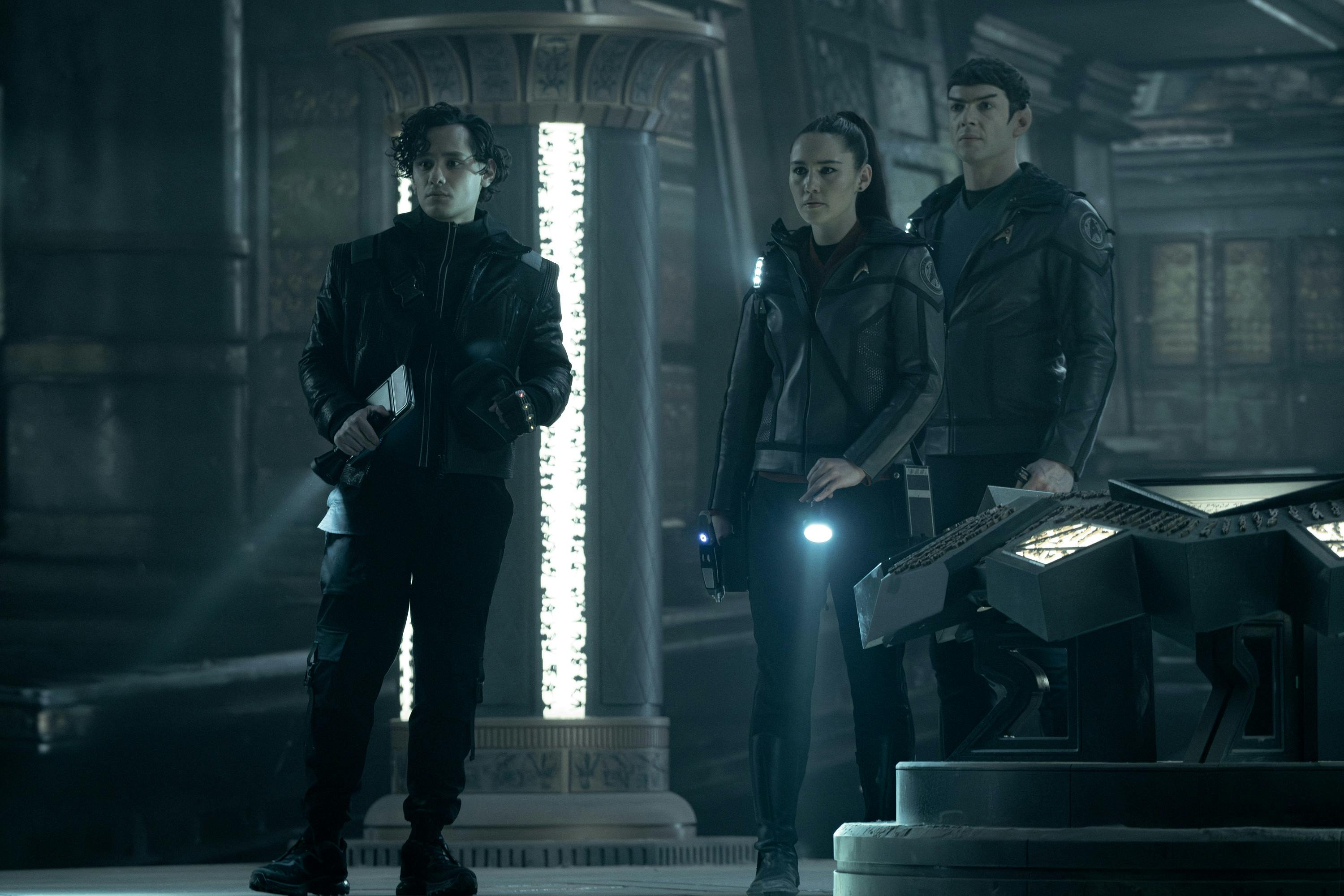 Beto, La'An, and Spock enter a temple, carrying flashlights, during an away mission in 'Through the Lens of Time'
