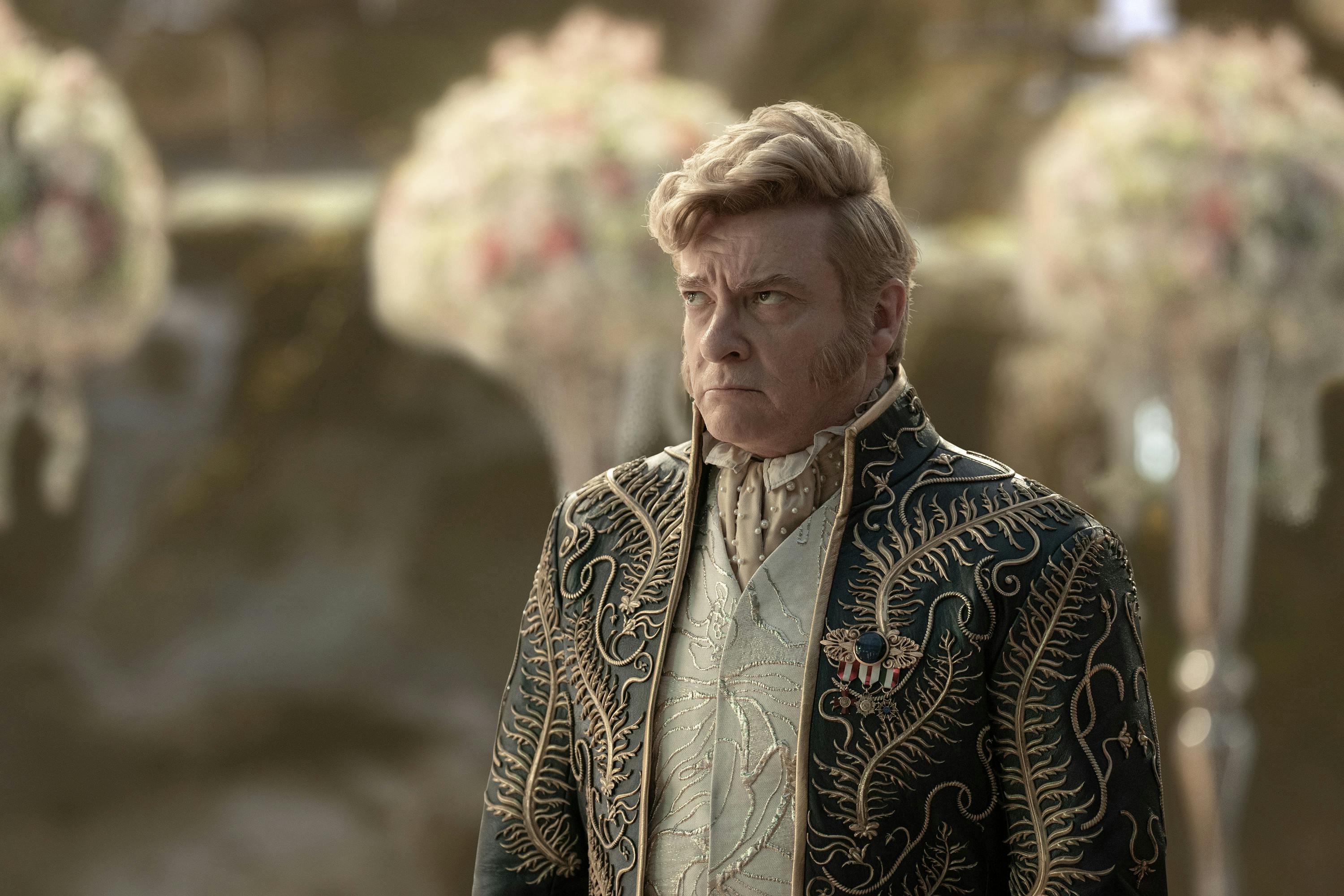 Interrupted by his father at Spock and Chapel's nuptials, Trelane glowers as he looks up in 'Wedding Bell Blues'