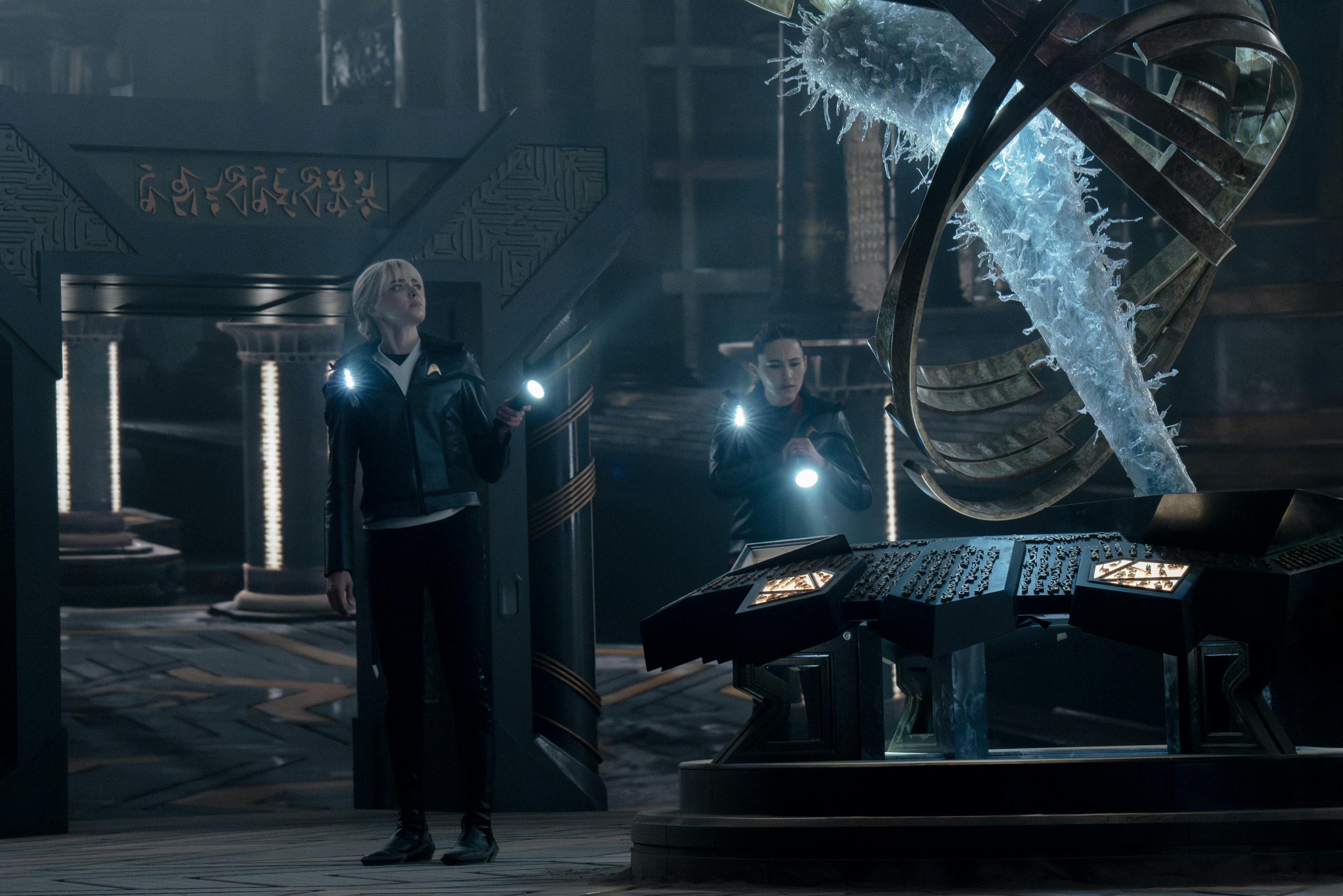 Chapel and La'An observe a statue at their research site on Vadia Nine in 'Through the Lens of Time'