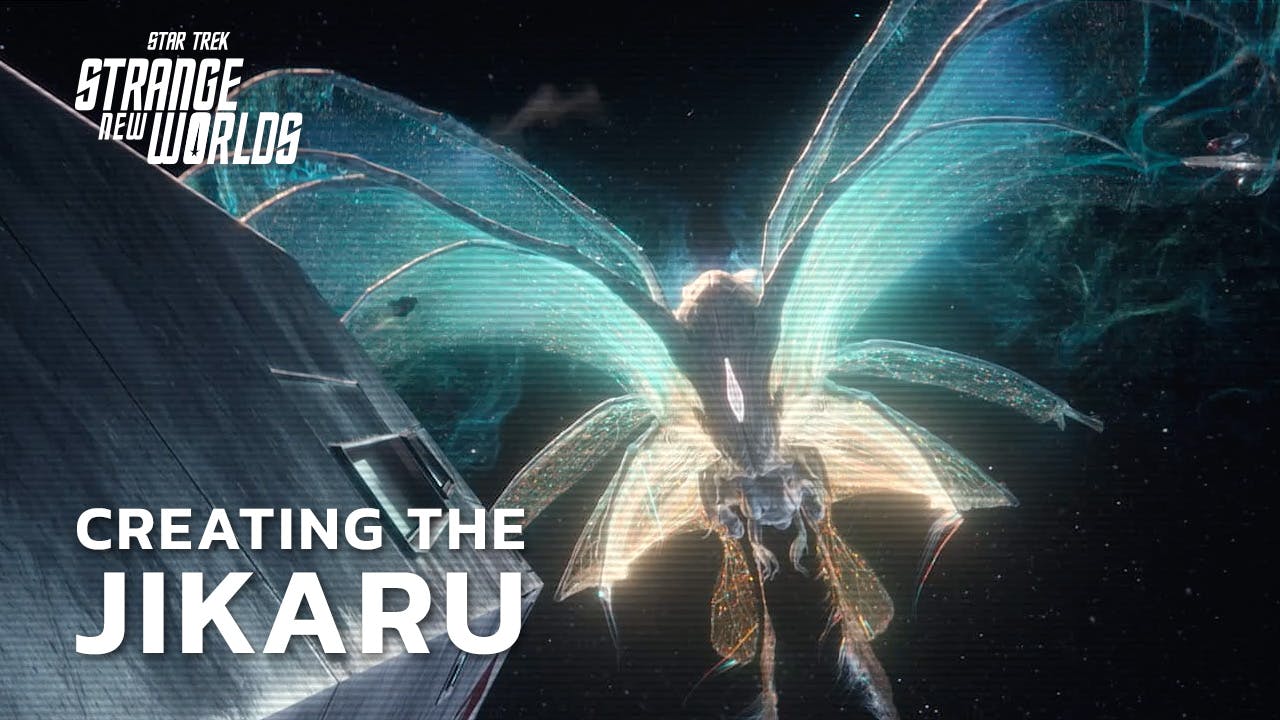 Close-up of the Jikaru with its wings spread next to the Enterprise in 'What is Starfleet?'