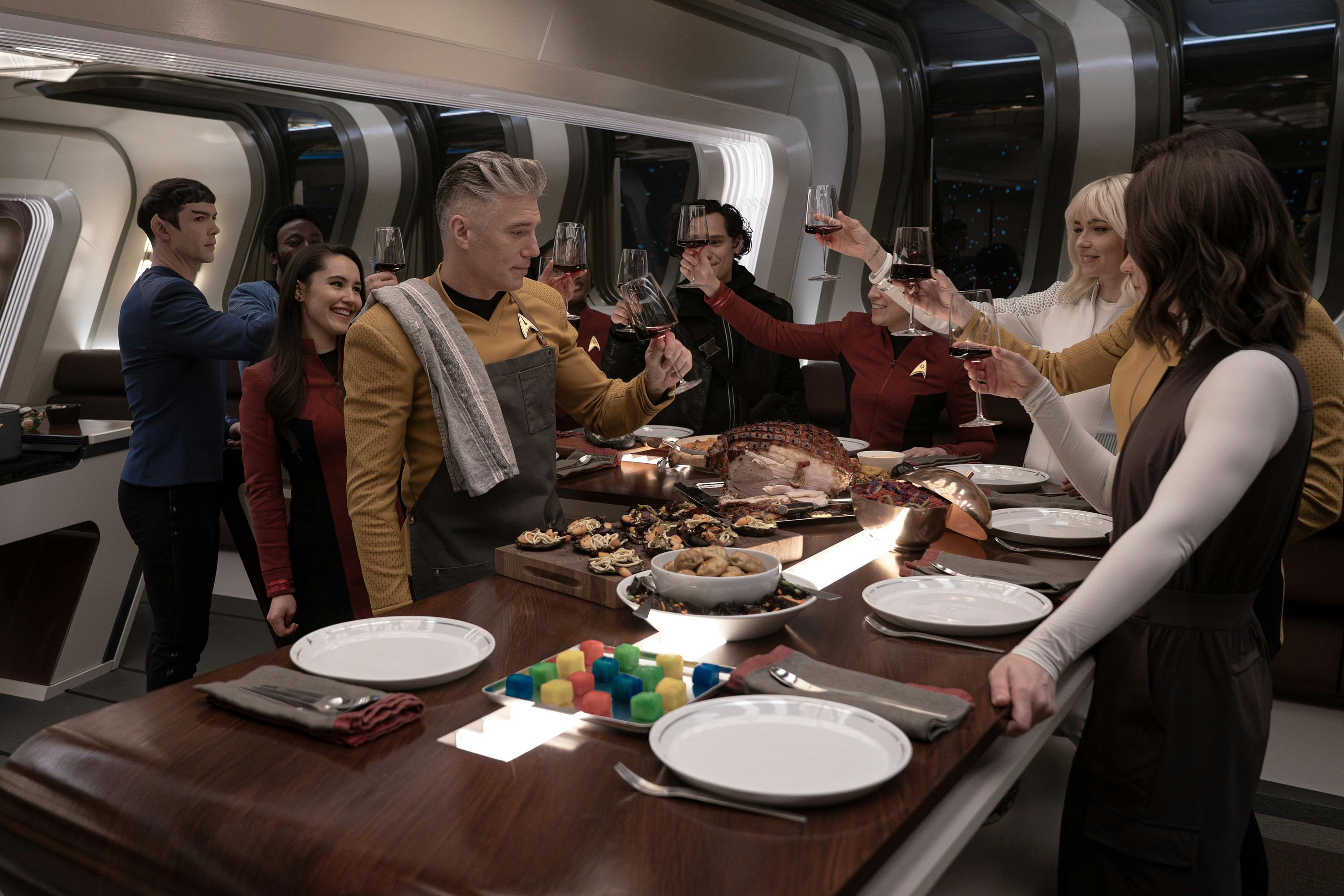 The crew enjoy a team meal in Pike's captain's quarters in 'What is Starfleet?'