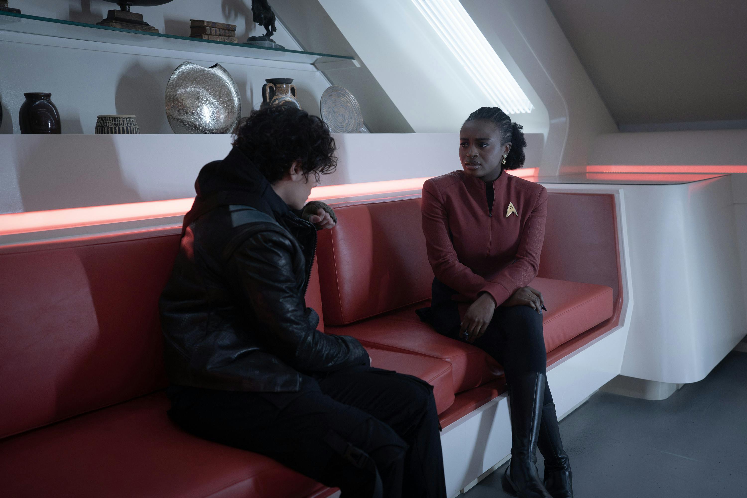 Ensign Nyota Uhura talks with Beto Ortegas in the Enterprise Ready Room in 'What is Starfleet?'