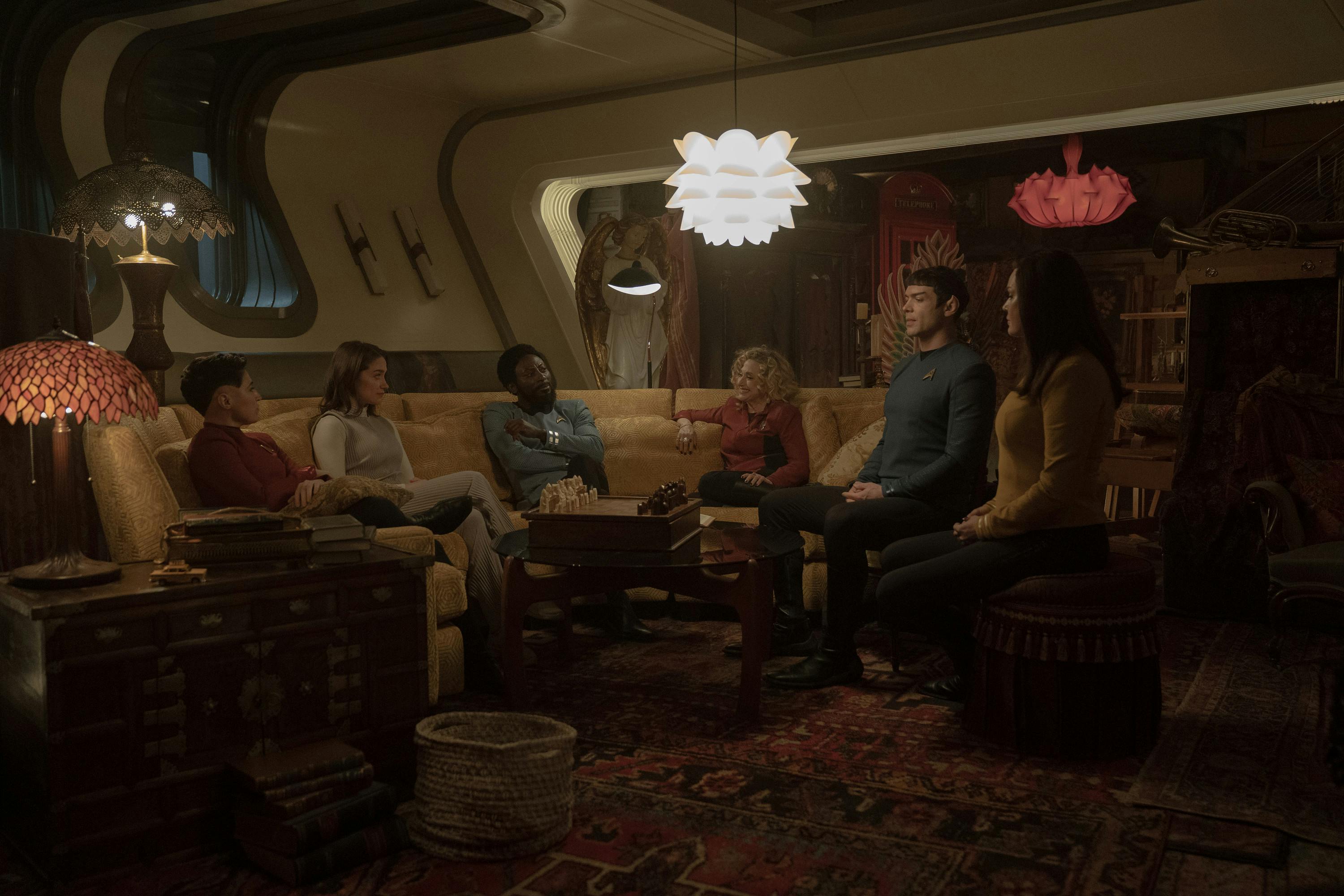 Erica Ortegas, Batel, M'Benga, Pelia, Spock, and Una seek refuge from their Vulcan crew in Pelia's quarters in 'Four-and-a-Half Vulcans'