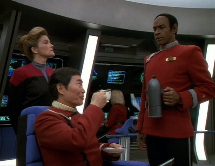 Janeway observes as Tuvok serves Captain Sulu on the Excelsior in 'Flashback'
