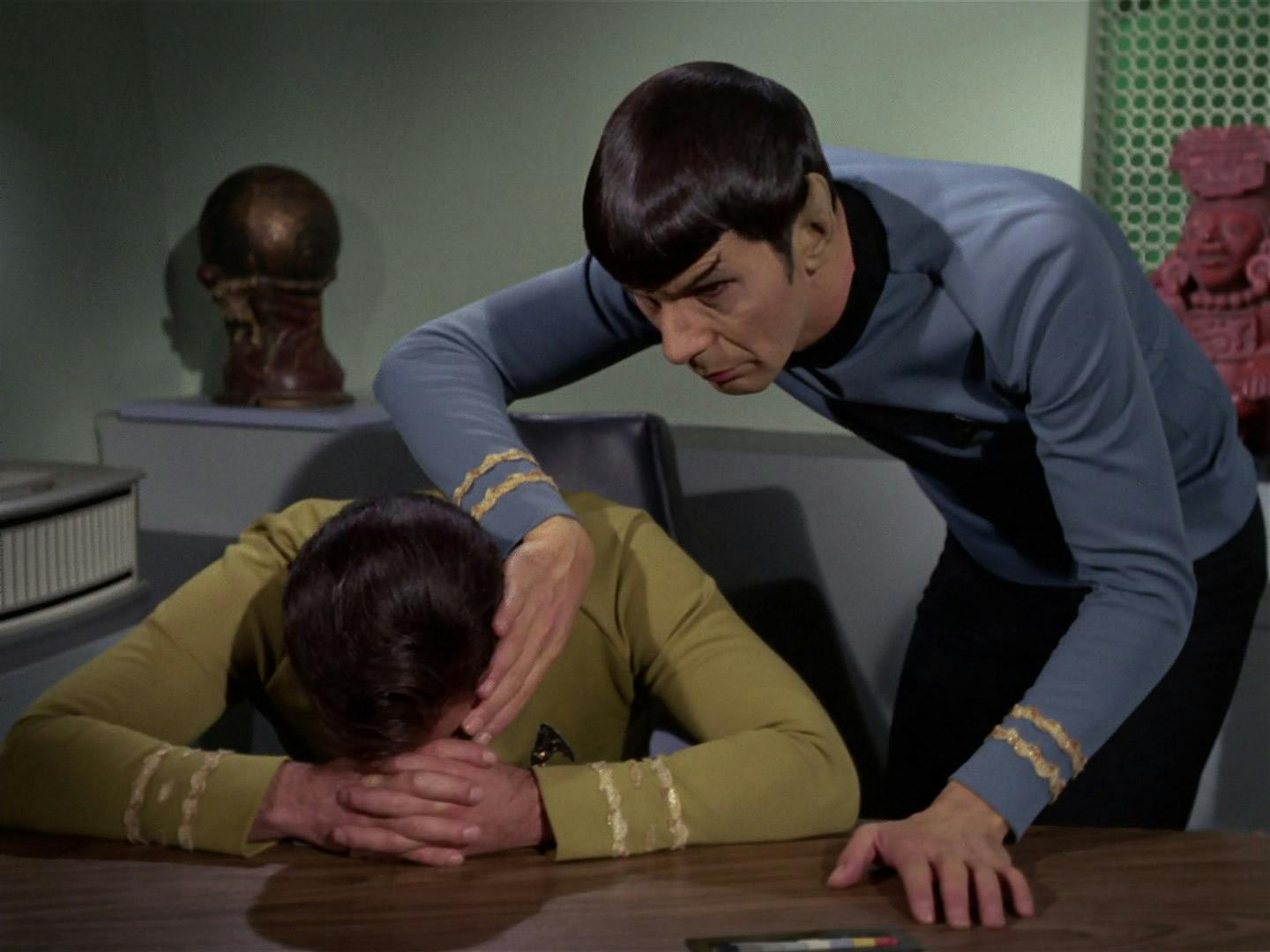 Spock eases Kirk's tragic agony with a mind meld in 'Requiem for Methuselah'