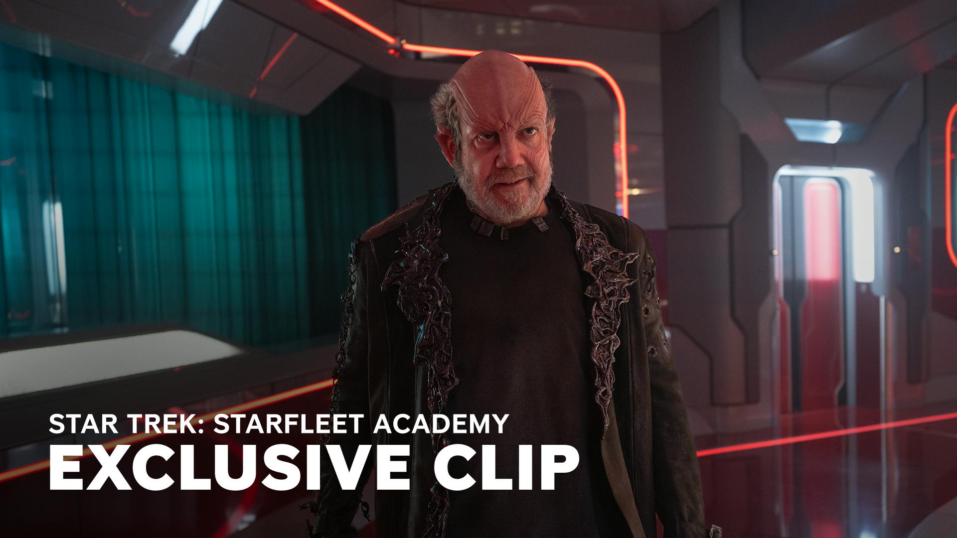 Paul Giamatti as Nus Braka standing in the middle of the frame, from Star Trek: Starfleet Academy