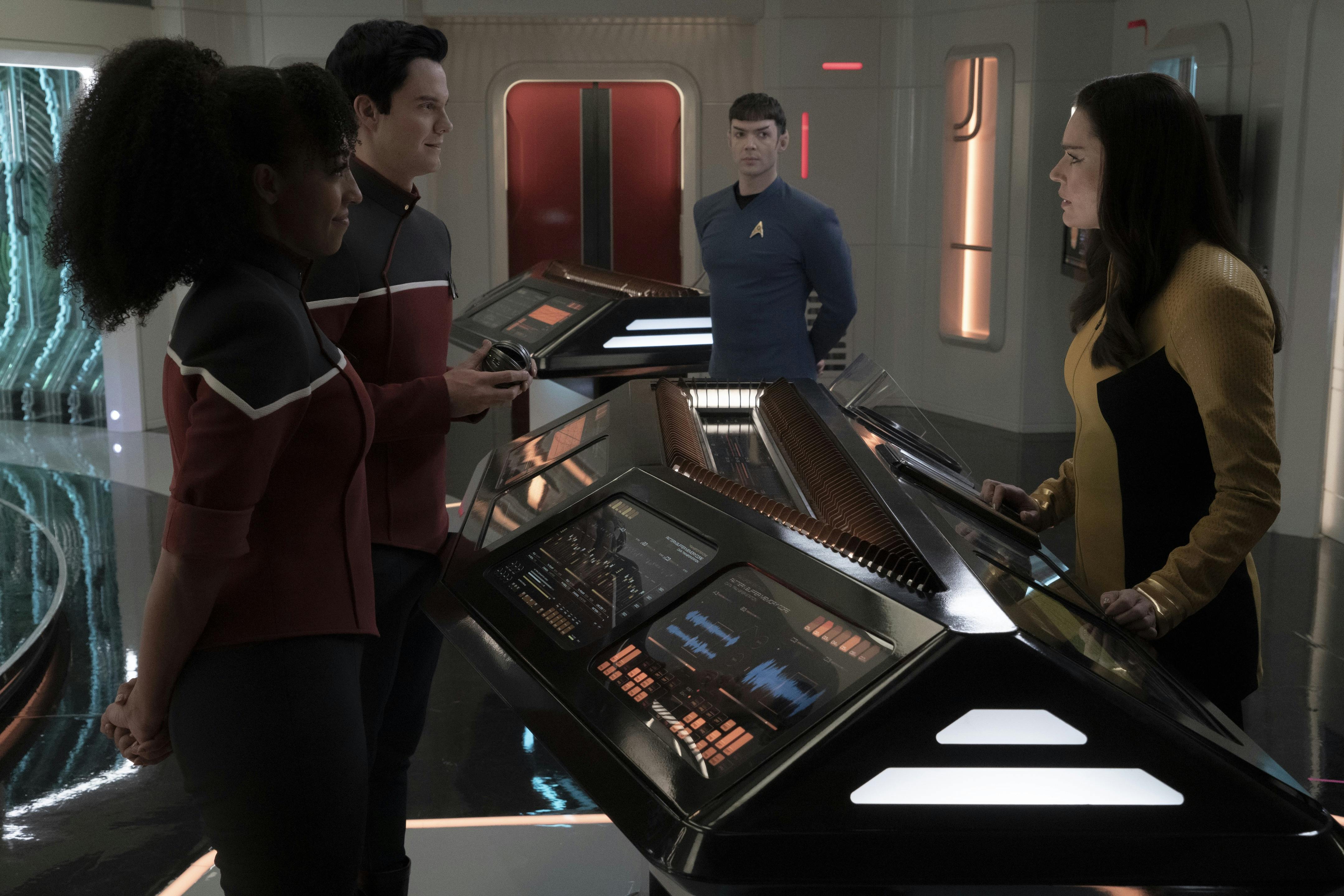 In the Transporter Room, Mariner and Boimler explain to Una that she is the poster girl for Starfleet in the future as Spock observes them in 'Those Old Scientists'