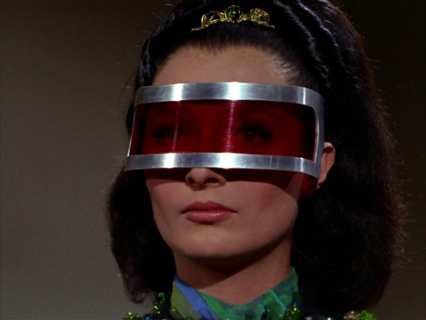 Close-up of Miranda Jones and her protector visor which conceals the fact that she's blind in 'Is There in Truth No Beauty?'