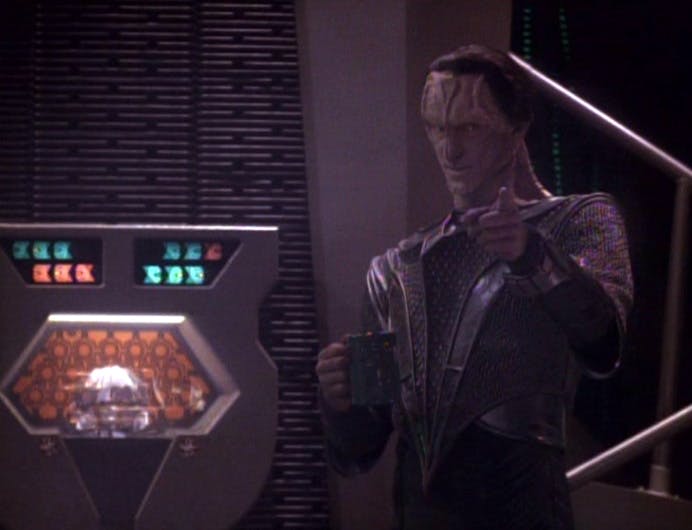 In Ops, Gul Dukat prepares a mug of red leaf tea while the disruptor in the replicator temporarily ceases firing. Dukat points at Garak in 'Civil Defense'