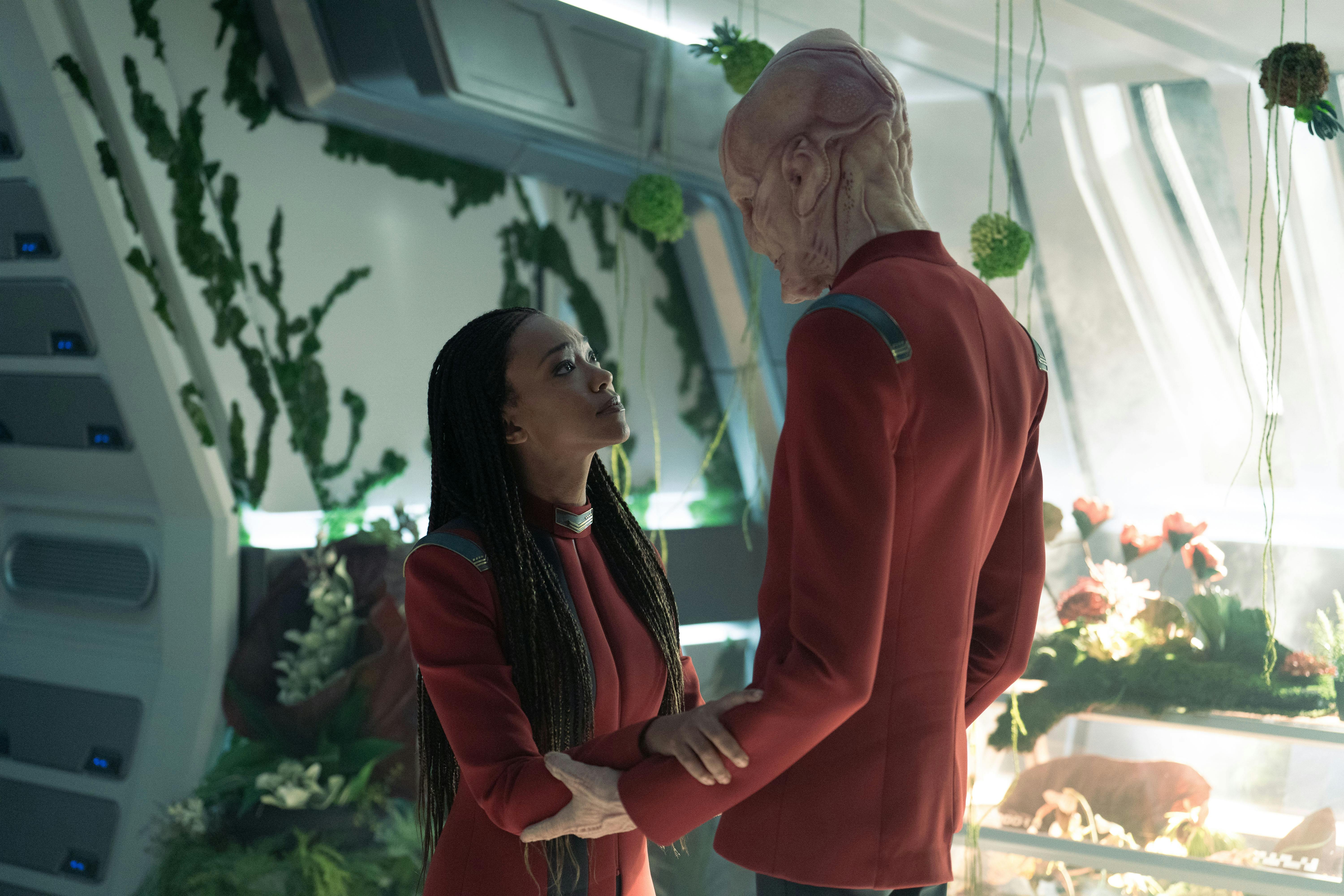 In his quarters, Burnham and Saru share an emotional moment as they both hold on to each other's forearms in Star Trek: Discovery Season 5