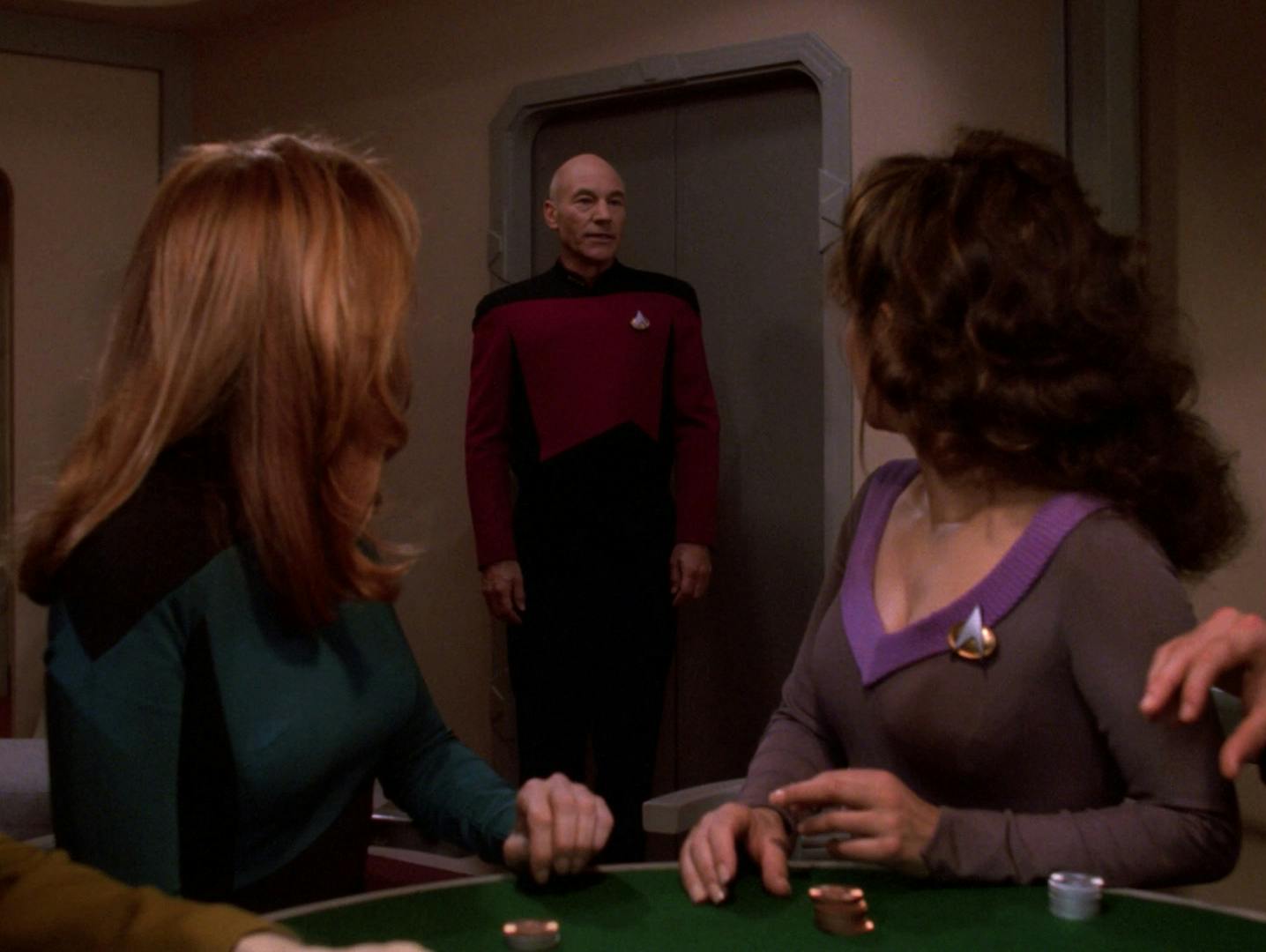 Picard enters crew quarters and asks his senior staff if he can join them for their game of poker in 'All Good Things...'